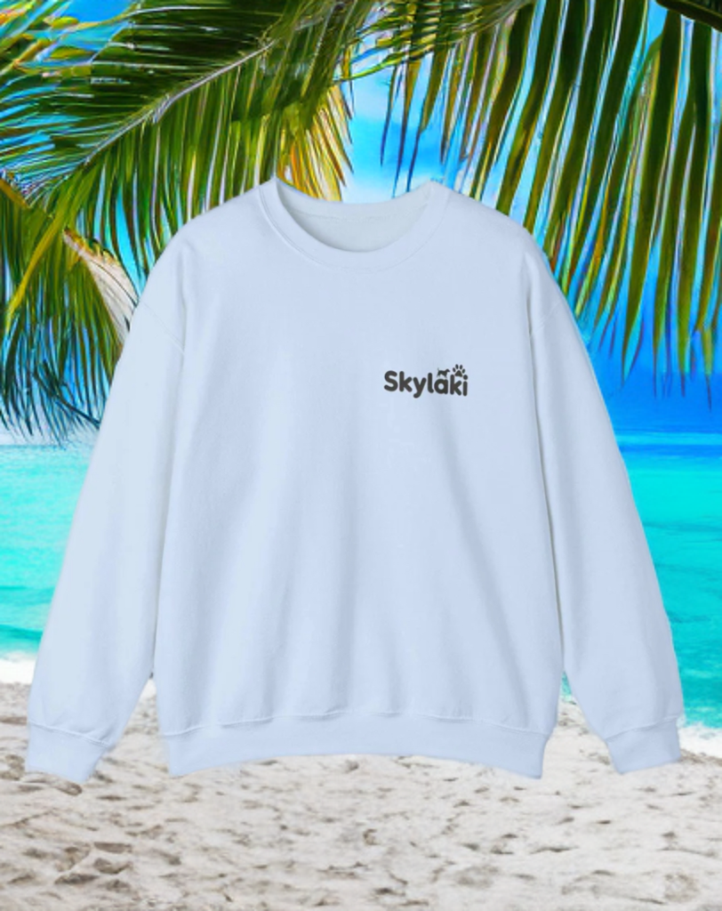 Unisex heavy blend crewneck sweatshirt in white with "Skylaki" logo, ideal for cozy everyday style.