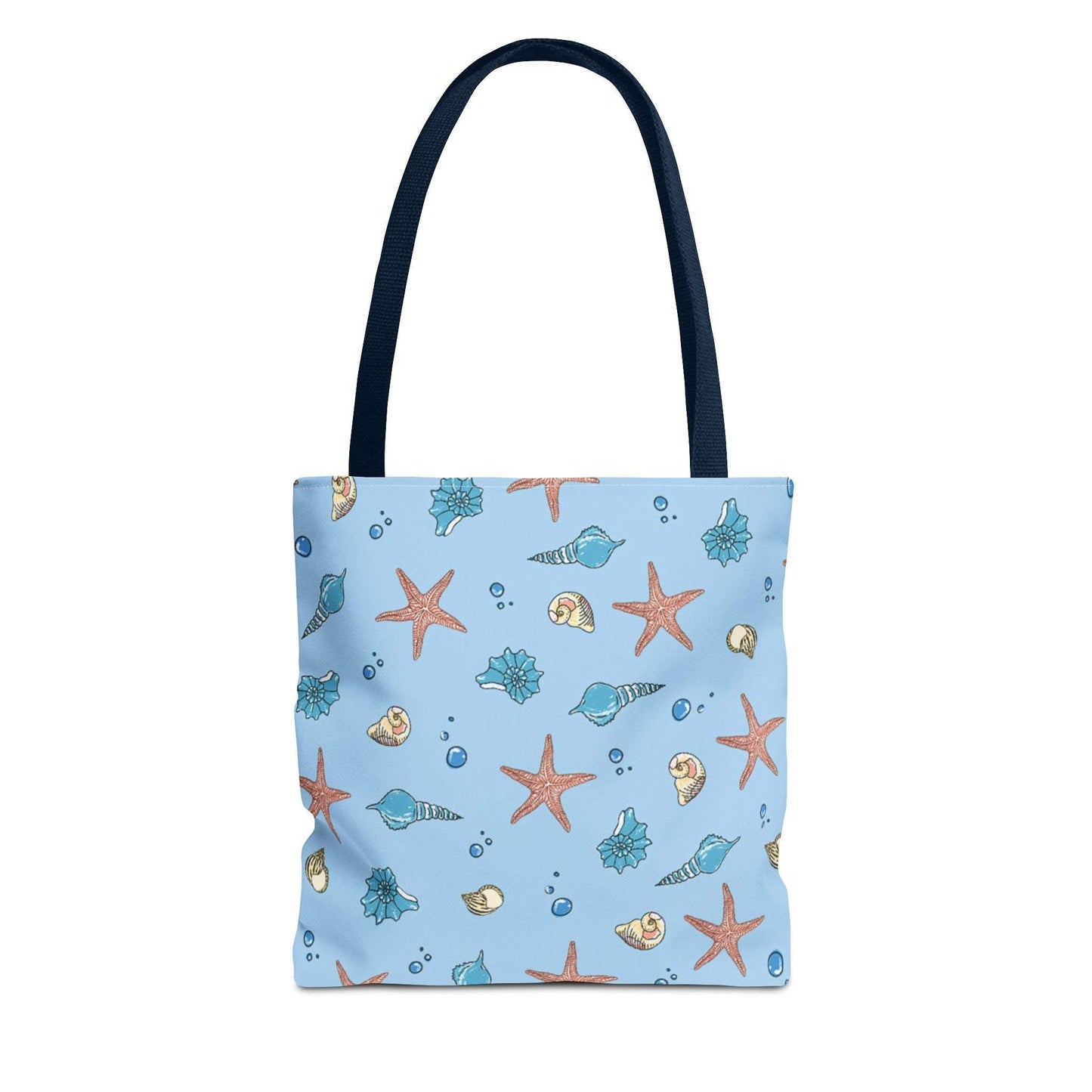 Beach tote bag with shell and starfish design on blue background.