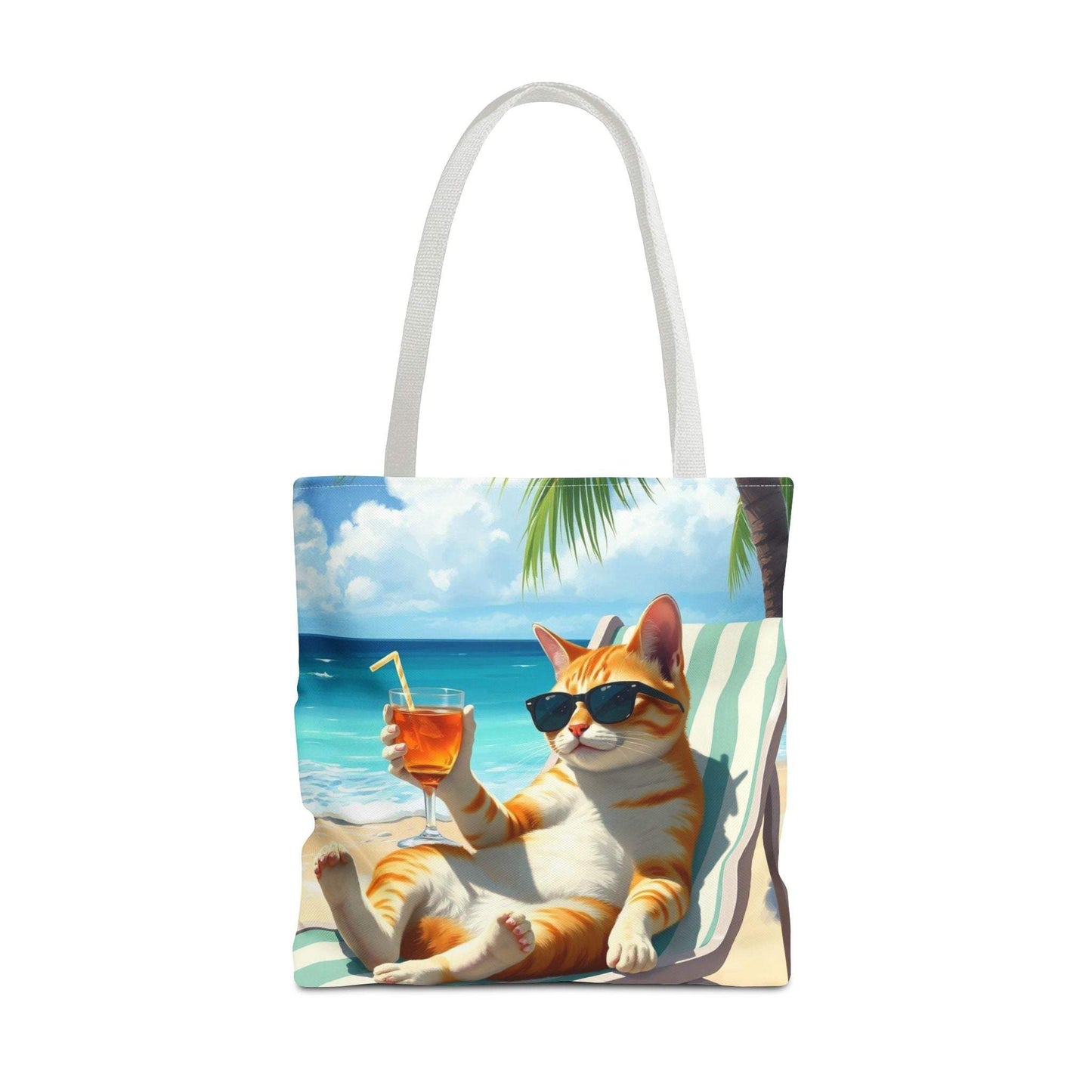 Cat tote bag with a relaxed cat sipping a drink by the beach, perfect for summer adventures.