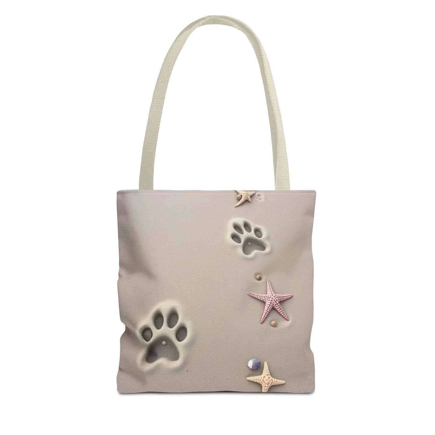 Beach tote bag with paw print and starfish design, perfect for pet lovers and beach enthusiasts.
