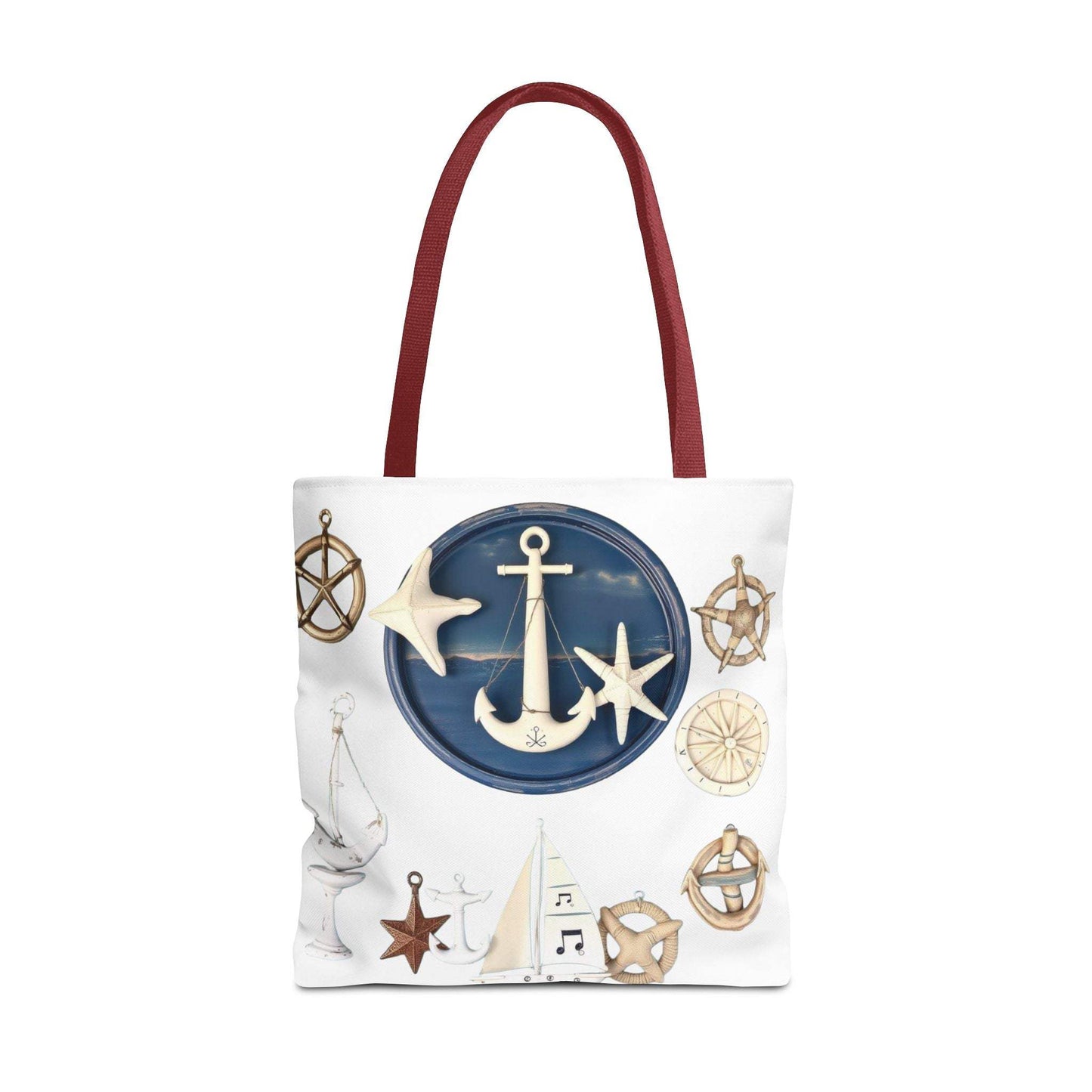 Nautical tote bag with anchor and star motif, featuring red handles and coastal-themed design.