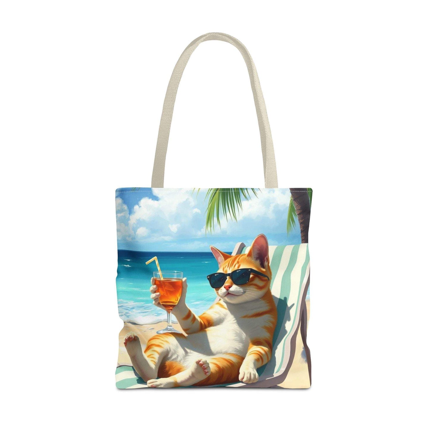 Cat tote bag with relaxed cat sipping drink by beach, perfect for summer adventures.