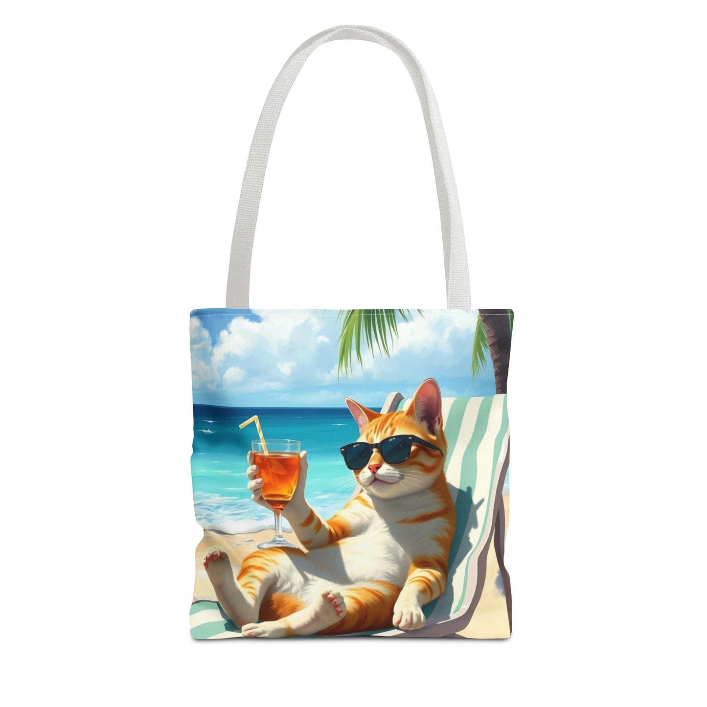 Cat tote bag featuring relaxed cat with drink on beach, perfect for summer adventures.