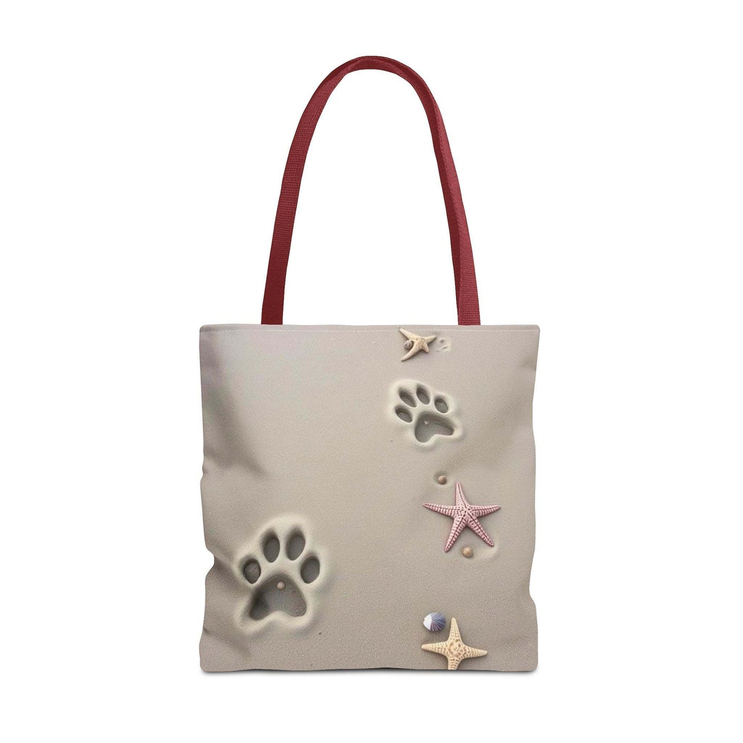 Beach tote bag with paw print and starfish design, perfect for pet lovers and coastal adventures.