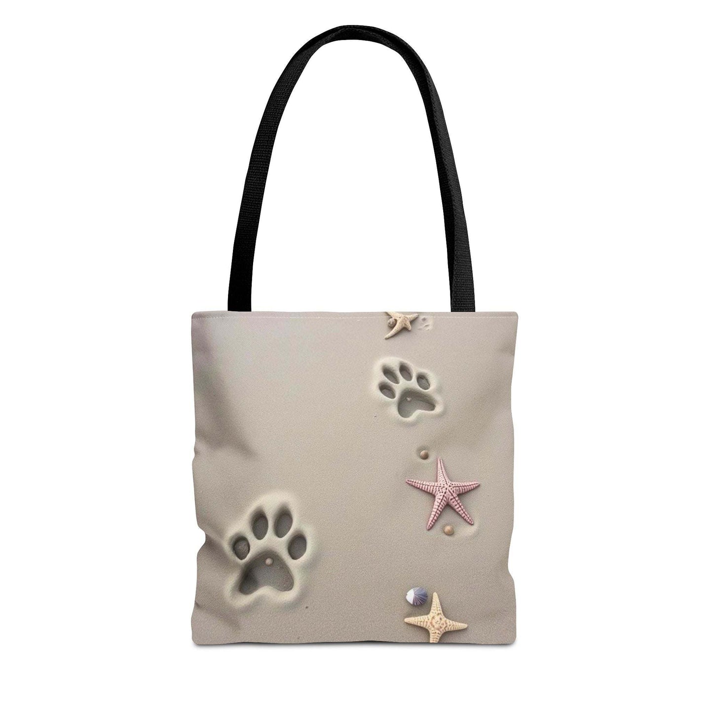 Beach tote bag with paw print and starfish design, ideal for pet lovers and beach outings.