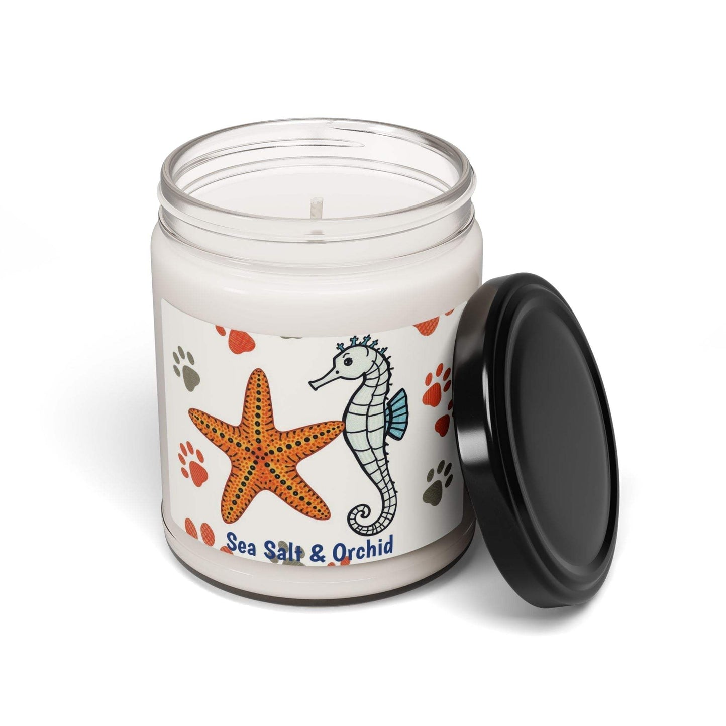 Scented soy candle with sea salt and orchid aroma in reusable glass jar.
