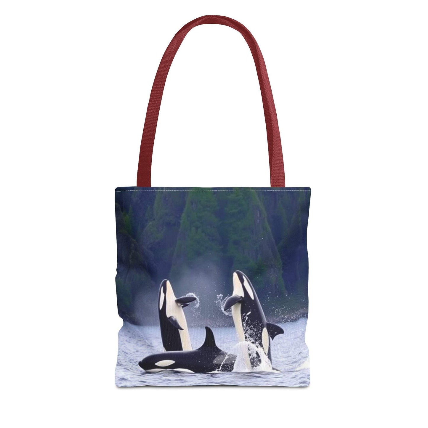 Eco-friendly ocean wildlife tote bag with orca whales design, ideal for shopping and everyday use.