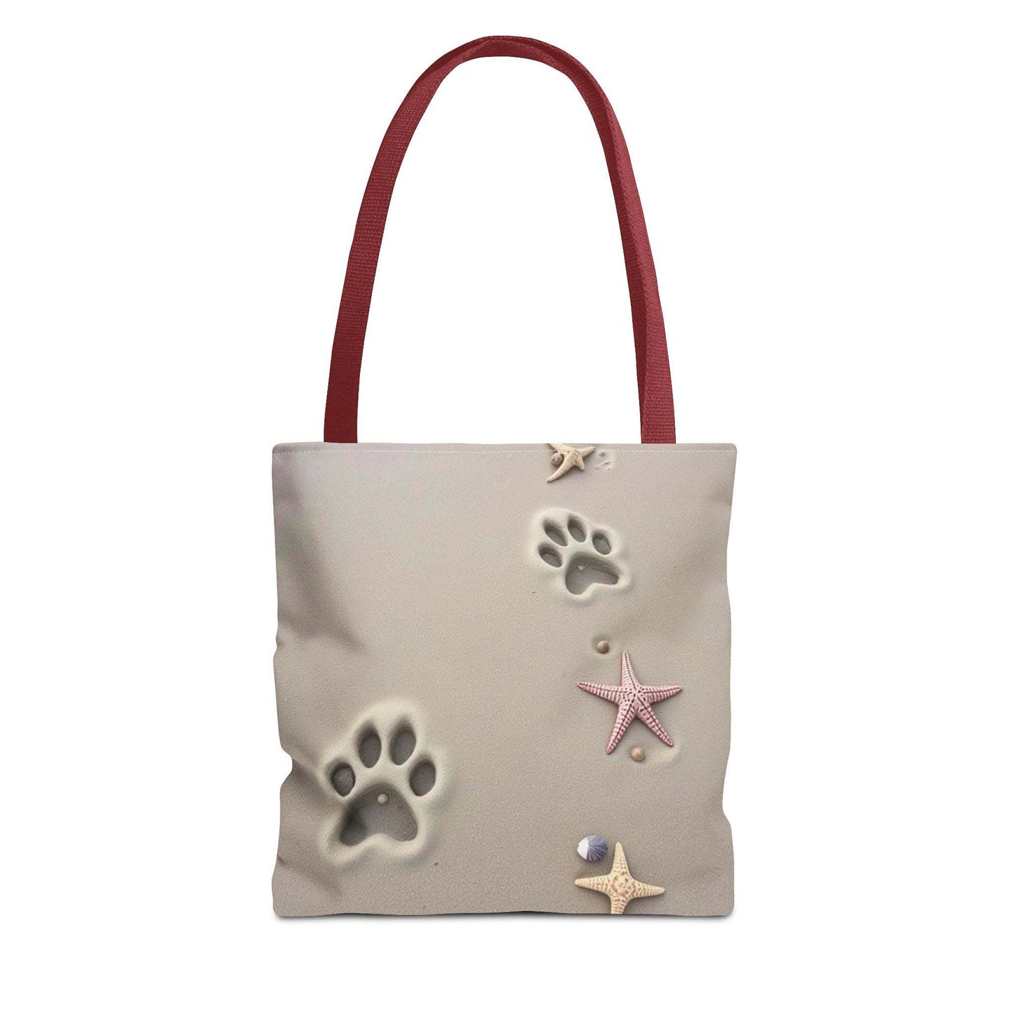 Beach tote bag with paw print and starfish design, perfect for pet lovers and beach outings.