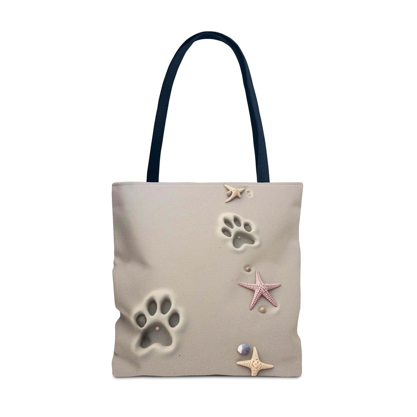 Beach tote bag with paw print and starfish design.