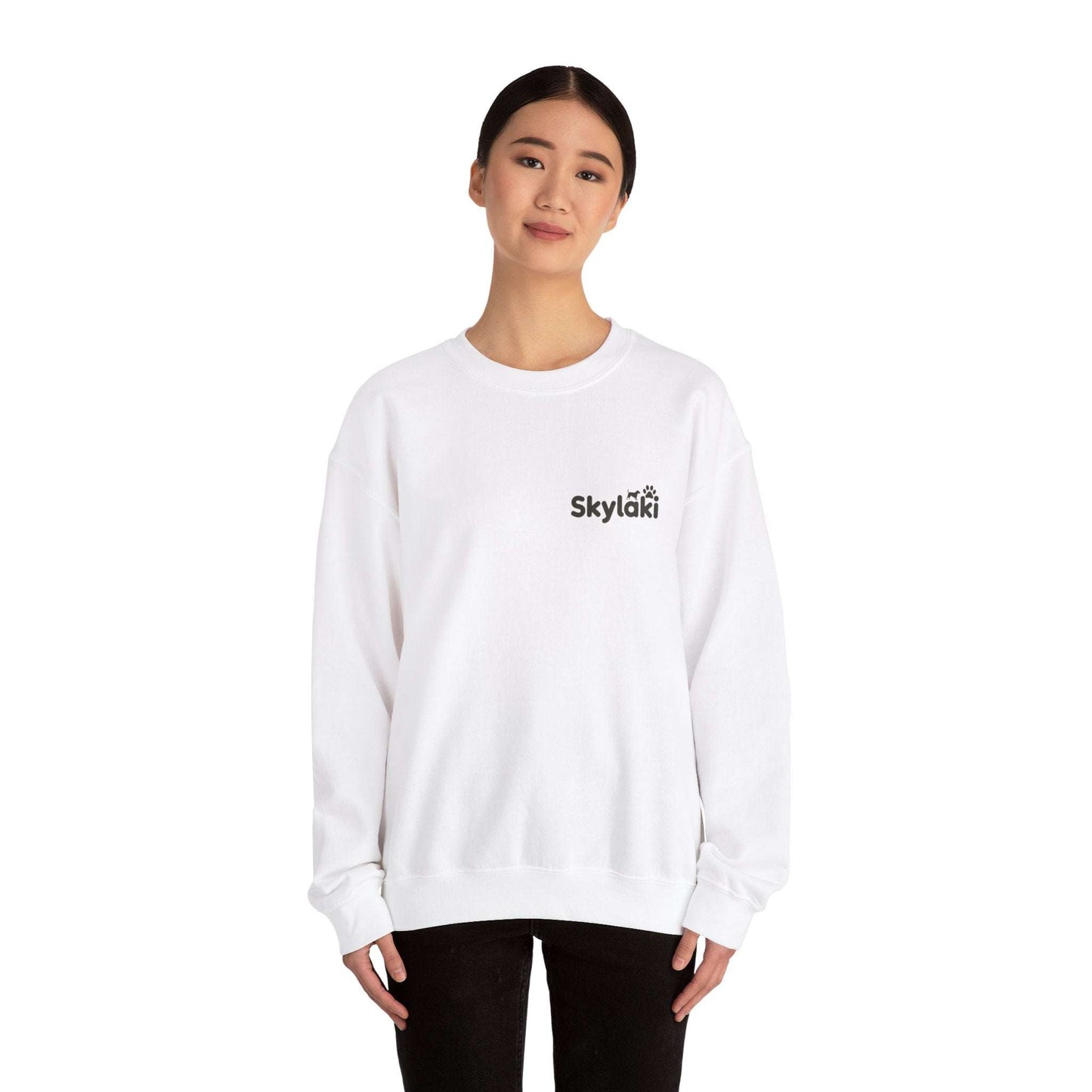 Unisex Heavy Blend™ Crewneck Sweatshirt in white, modeled, showcasing cozy comfort and stylish design for everyday wear.