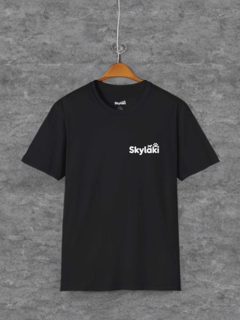Unisex Softstyle T-Shirt in black with minimalist design hanging on hanger.