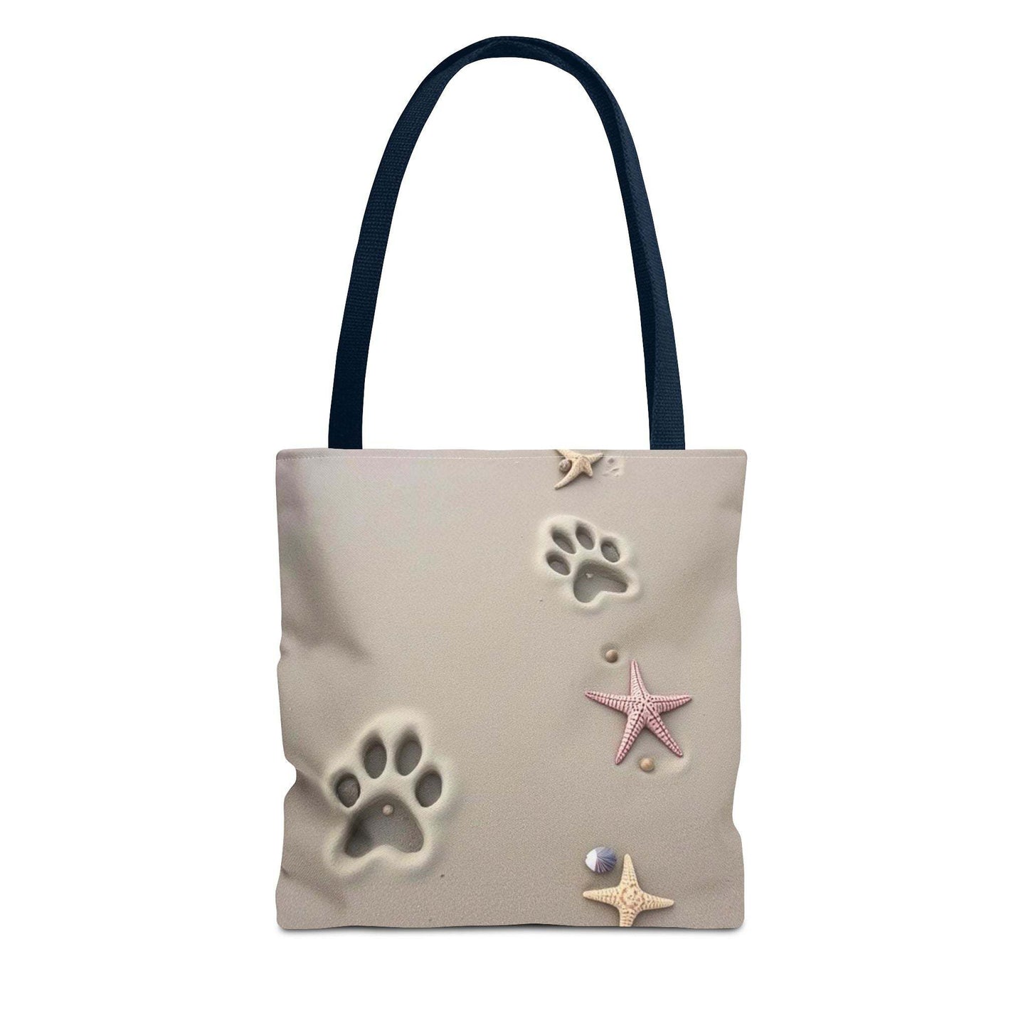 Beach tote bag with paw print and starfish design, ideal for pet lovers and beach outings.