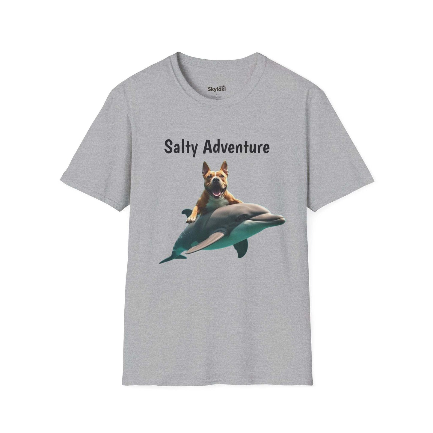 Unisex t-shirt with "Salty Adventure" graphic of a dog riding a dolphin, perfect for fun beach life enthusiasts.