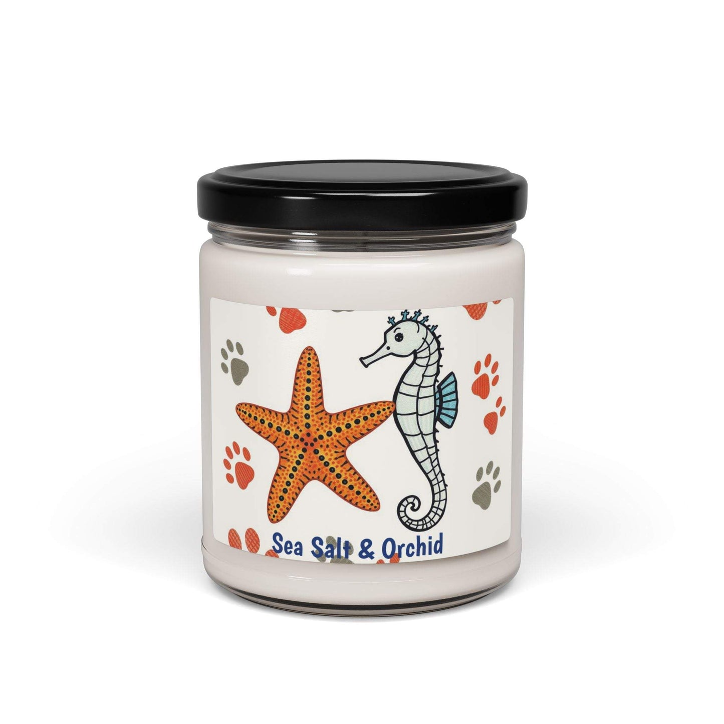 Scented soy candle in glass jar with sea salt and orchid label, featuring starfish and seahorse design.