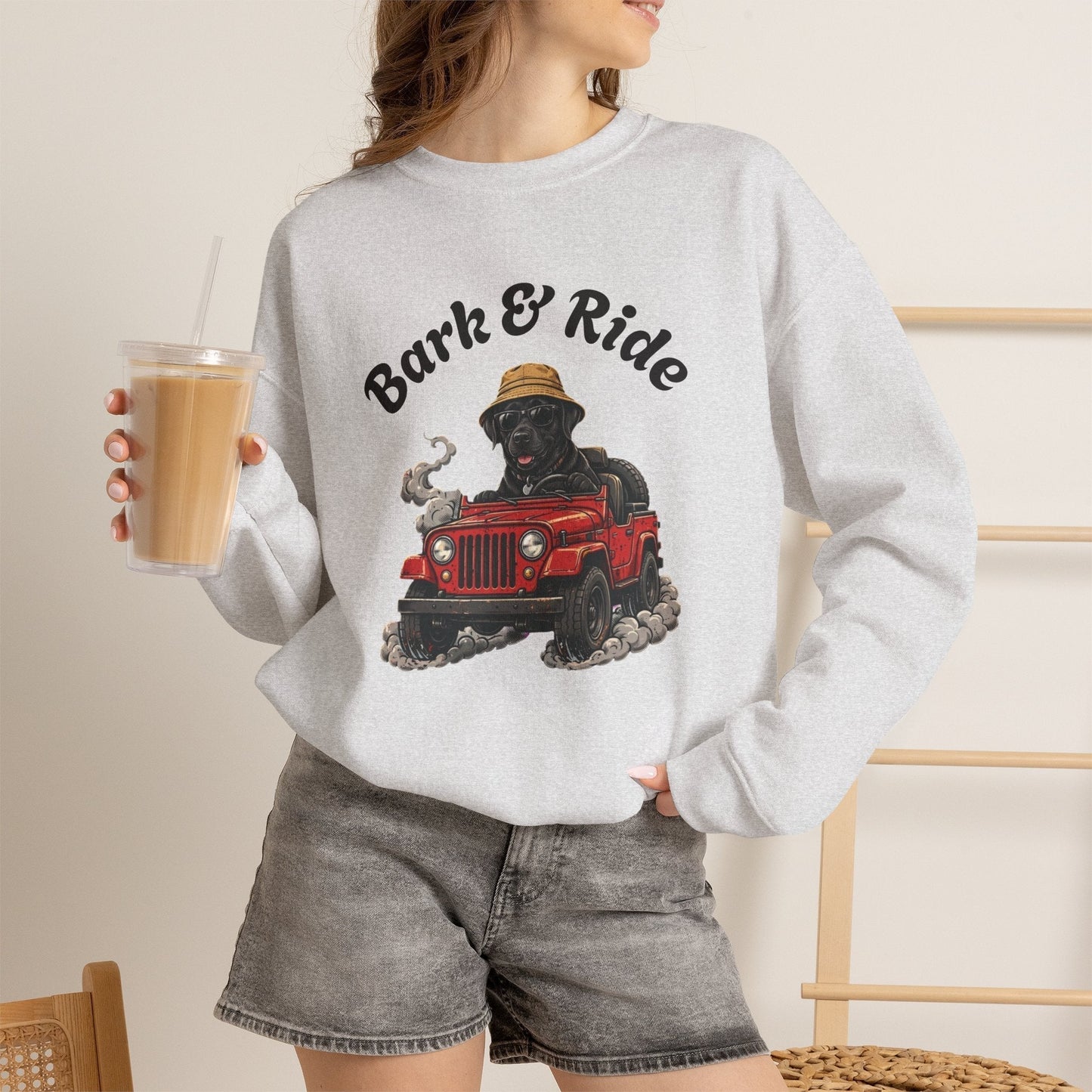 Crewneck sweatshirt with playful black lab dog driving red jeep graphic and straw hat