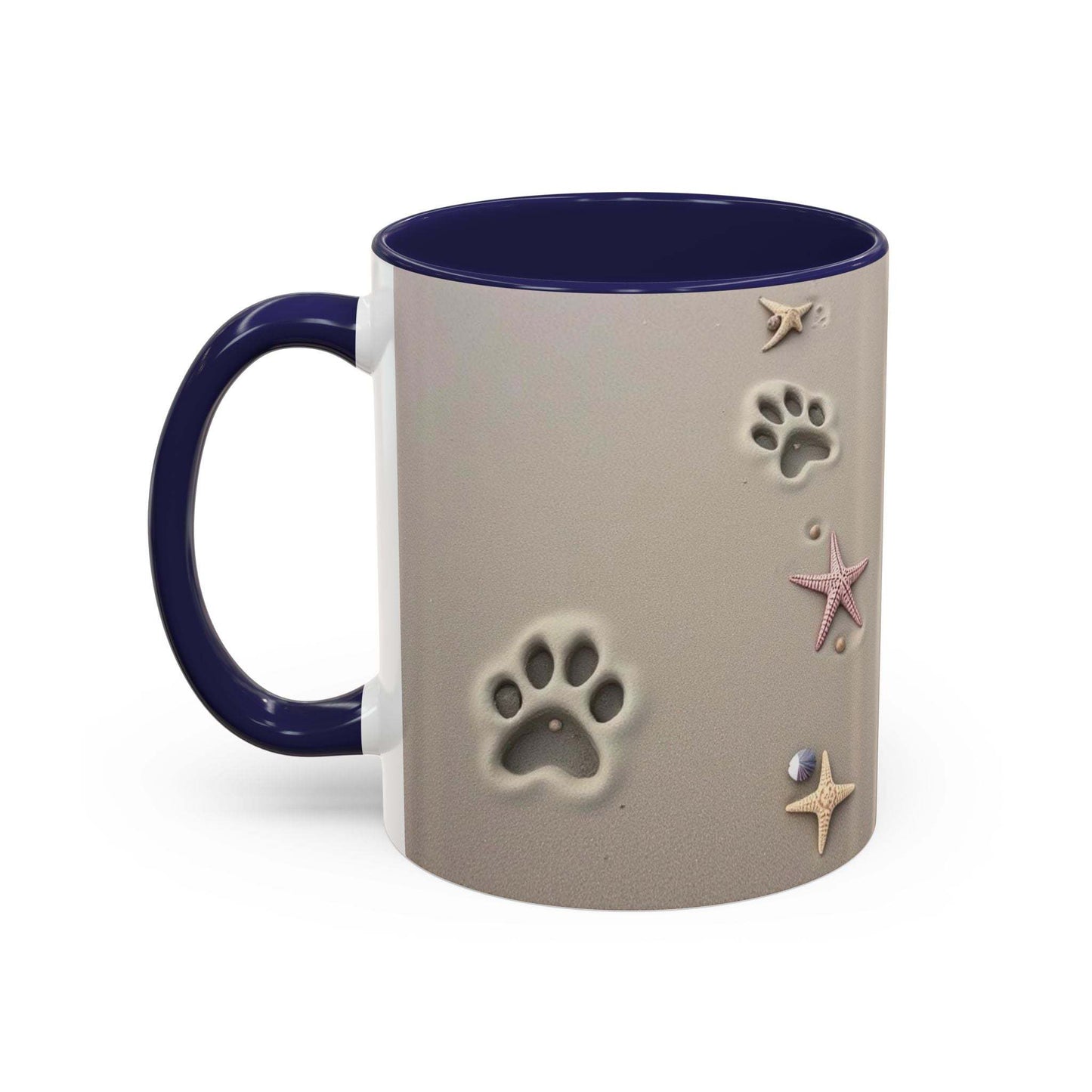 Nautical coffee mug with starfish and paw prints design.