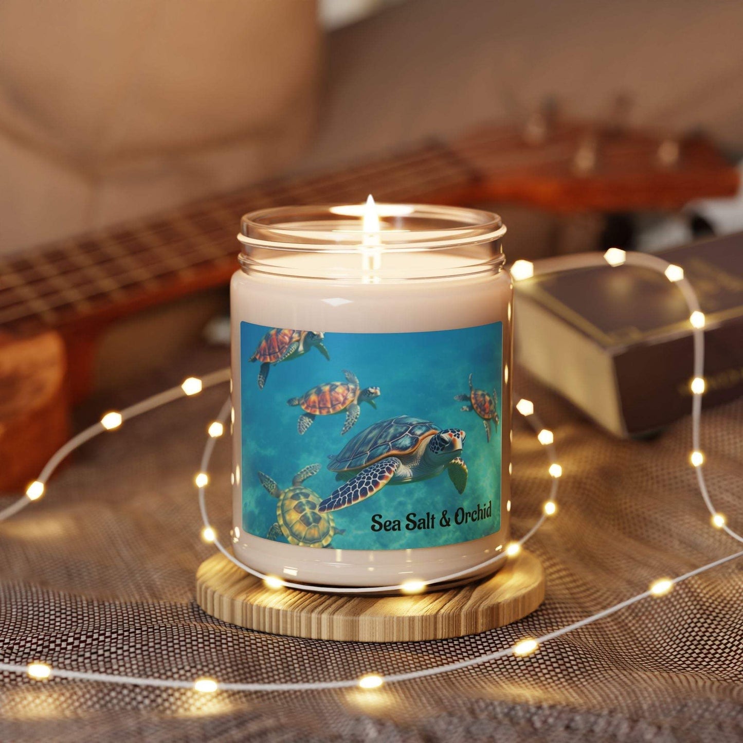 Soy candle with tropical sea salt and orchid scent in reusable glass jar.