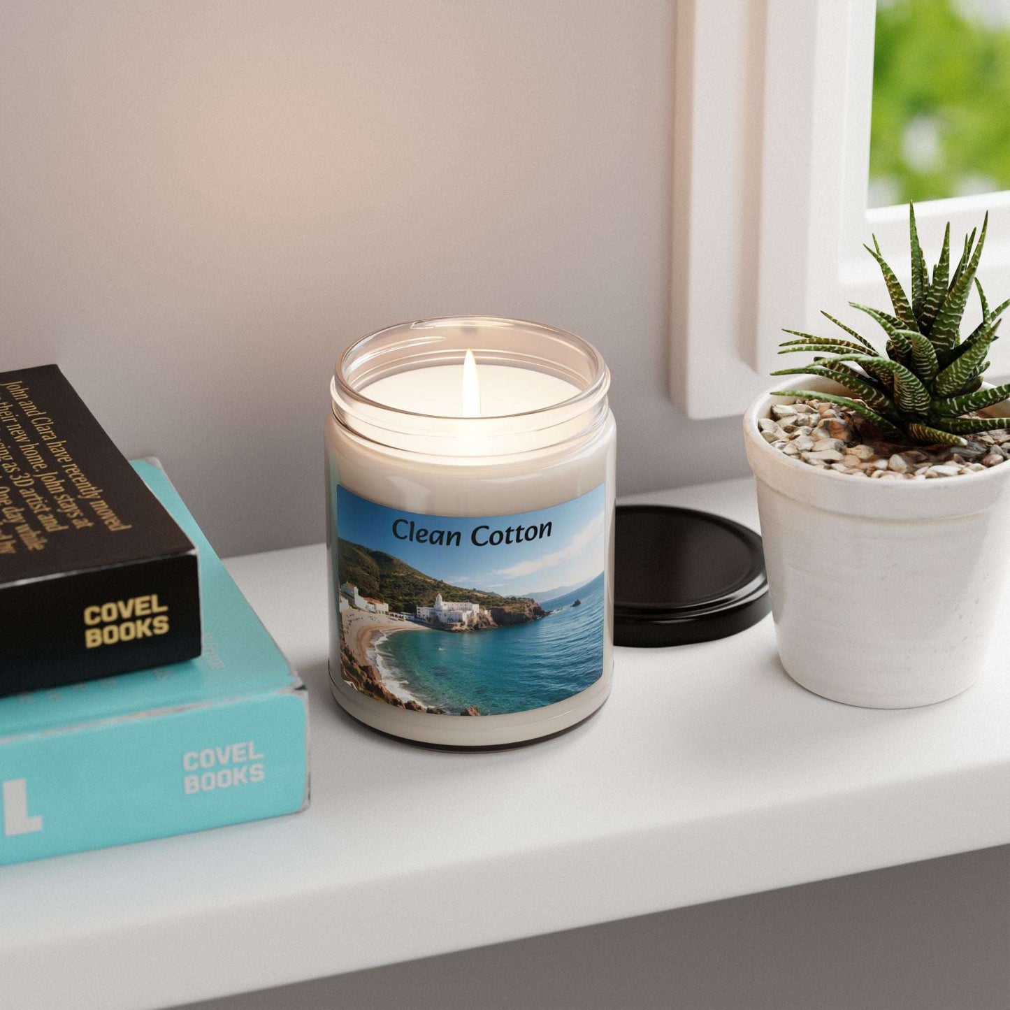 Clean Cotton Scented Soy Candle on shelf, enhancing home decor.