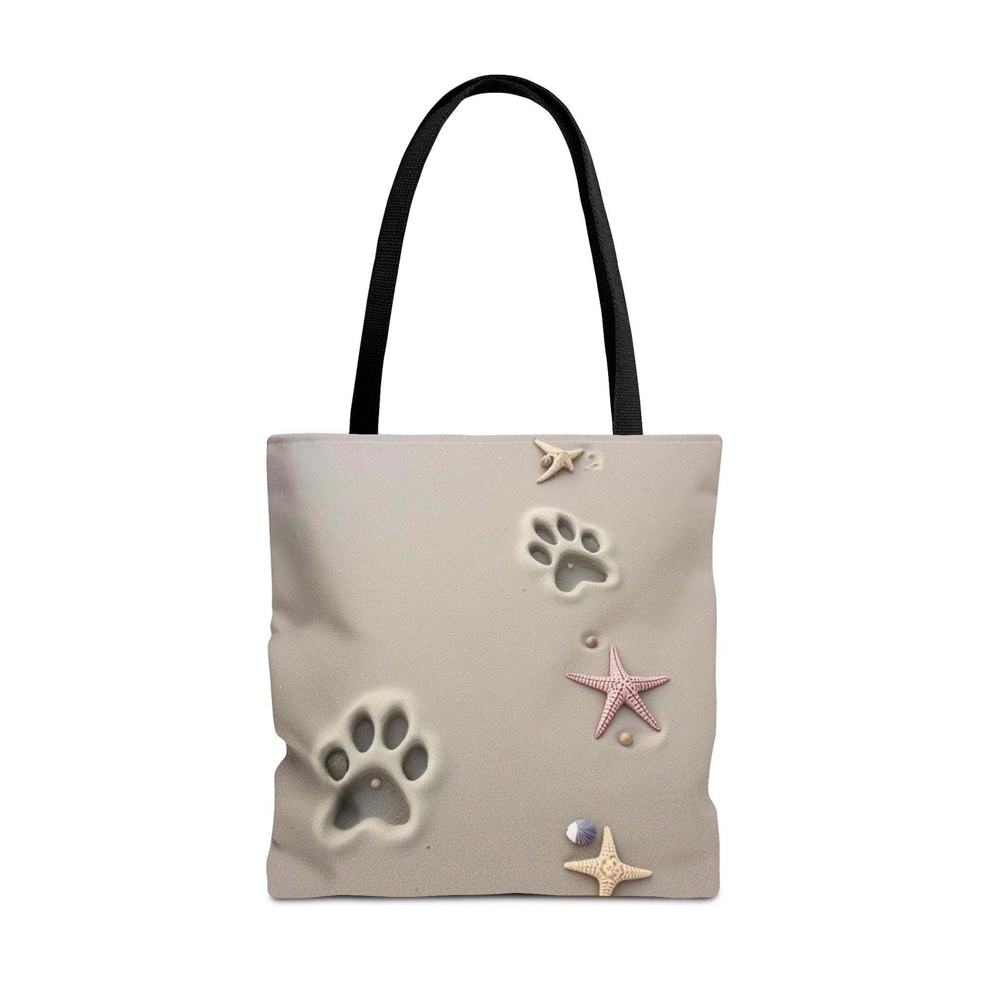 Beach tote bag with paw print and starfish design for pet lovers.
