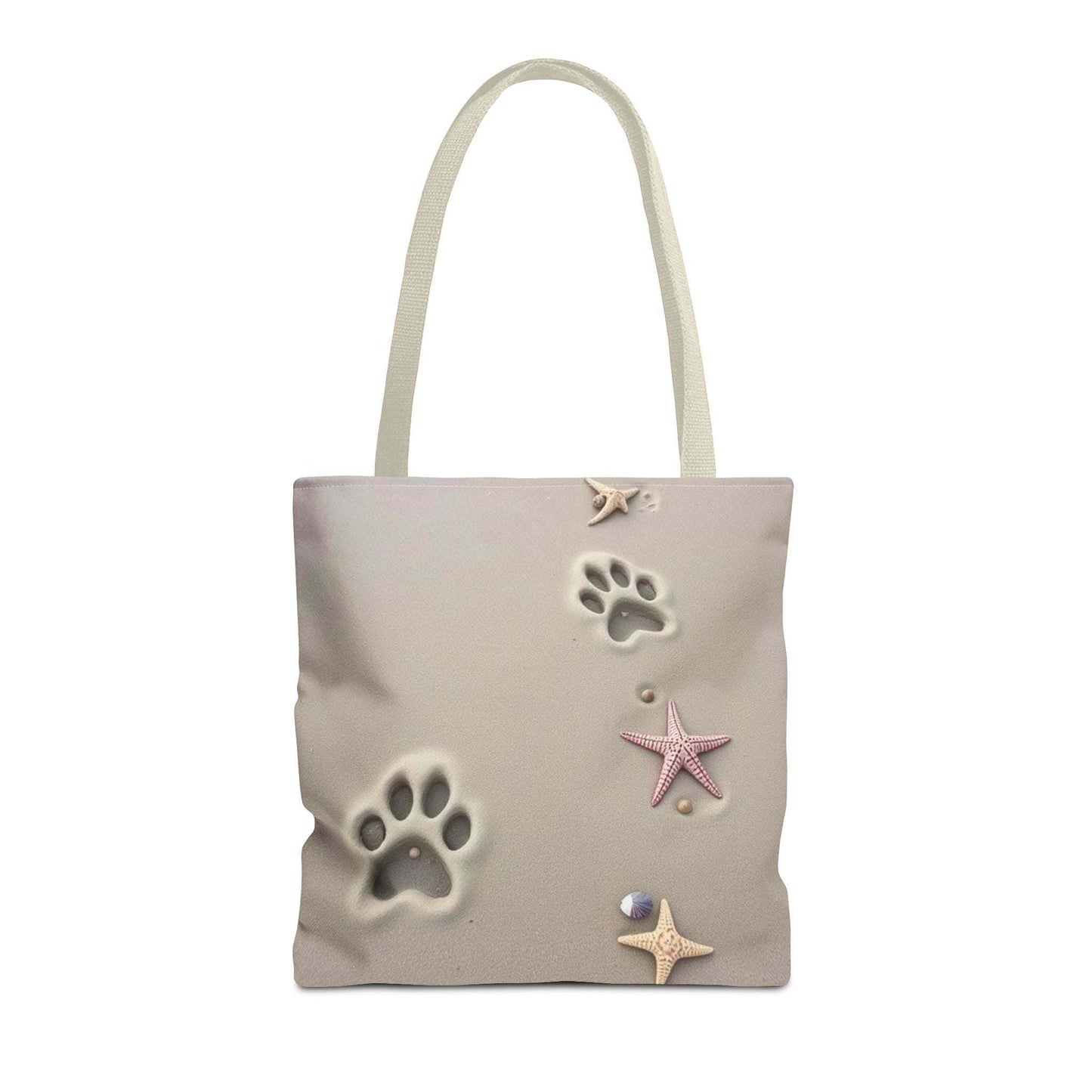 Beach tote bag with paw print and starfish design, perfect for pet lovers and beach outings.