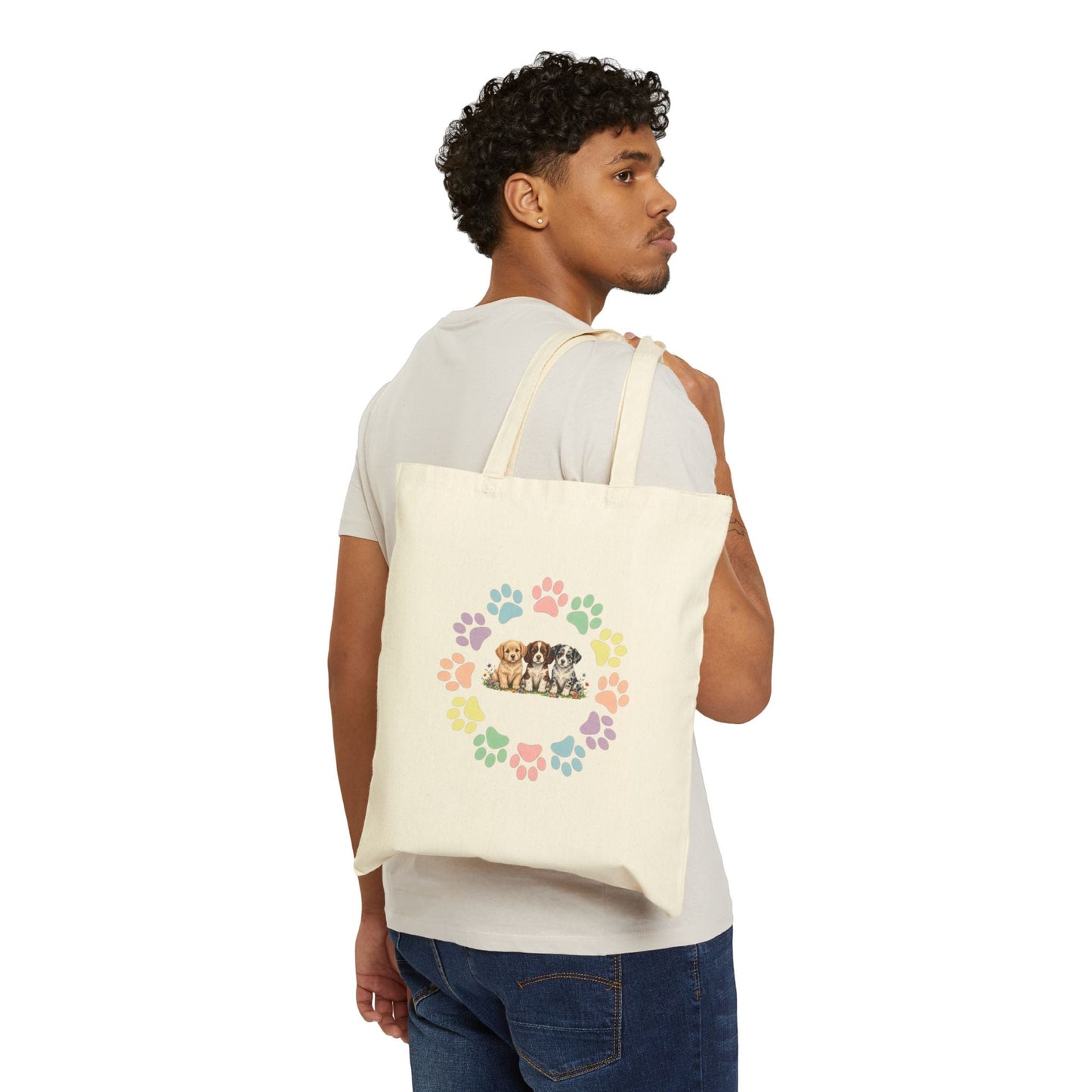 Natural canvas tote bag with colorful rainbow dog paw prints arranged in a circular wreath - Skylaki brand
