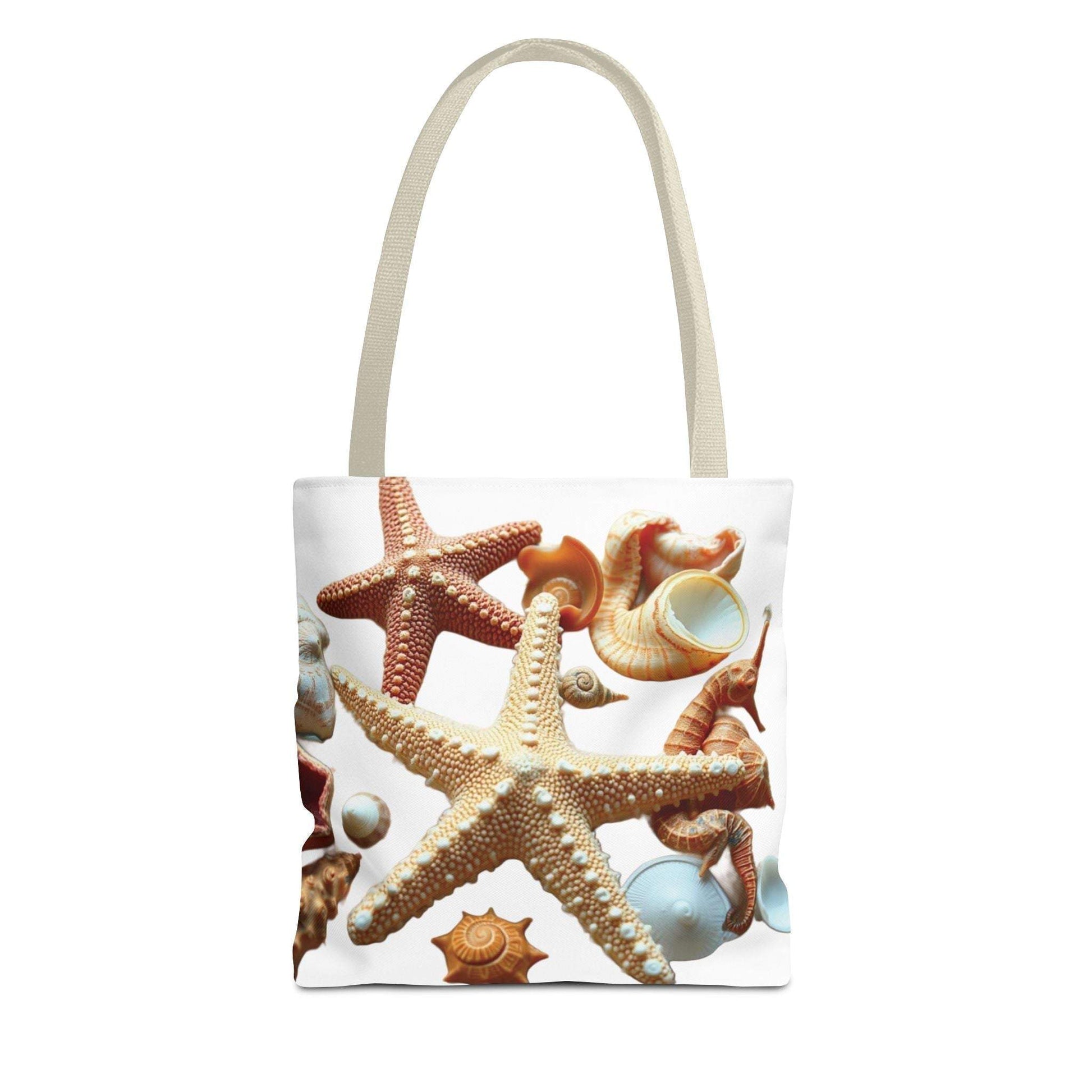 Beach tote bag with starfish and seashell design.