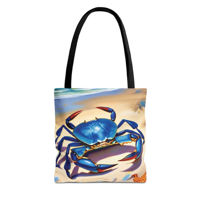 Ocean-inspired beach bag tote with blue crab and starfish design on a beach backdrop.