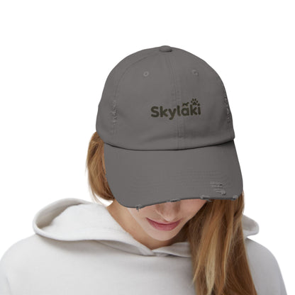 Unisex distressed cap with Skylaki logo, vintage style, cotton twill, perfect for dog lovers.