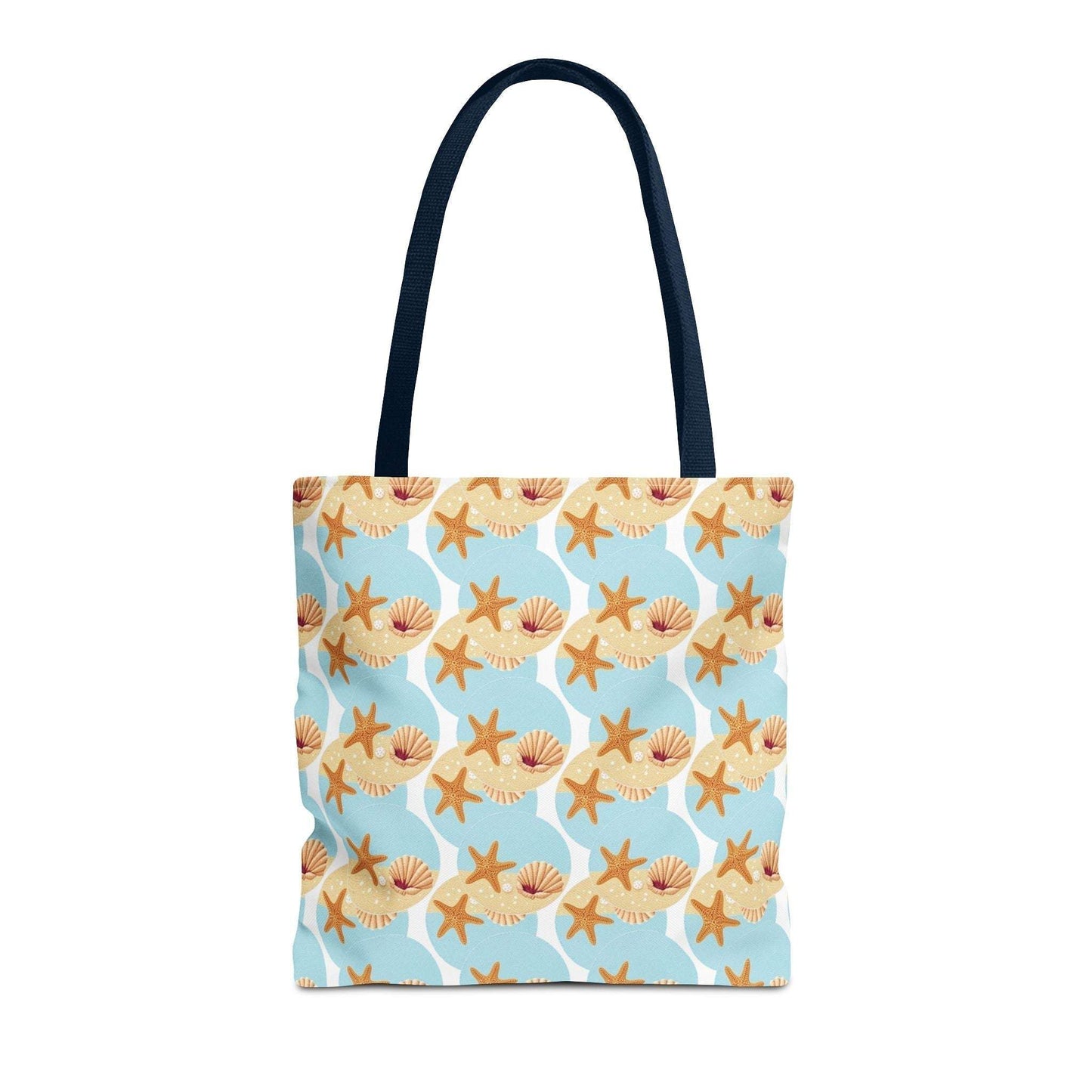 Seashell and starfish patterned beach tote bag with black handles.