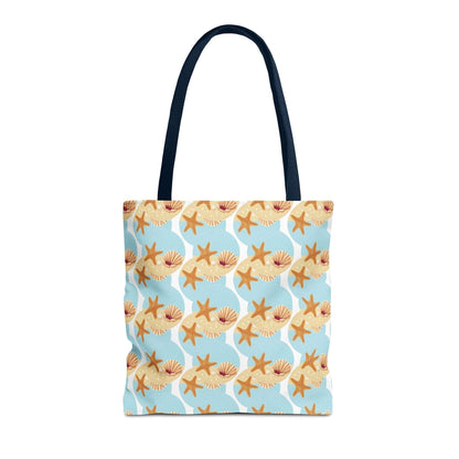 Seashell and starfish patterned beach tote bag with black handles.