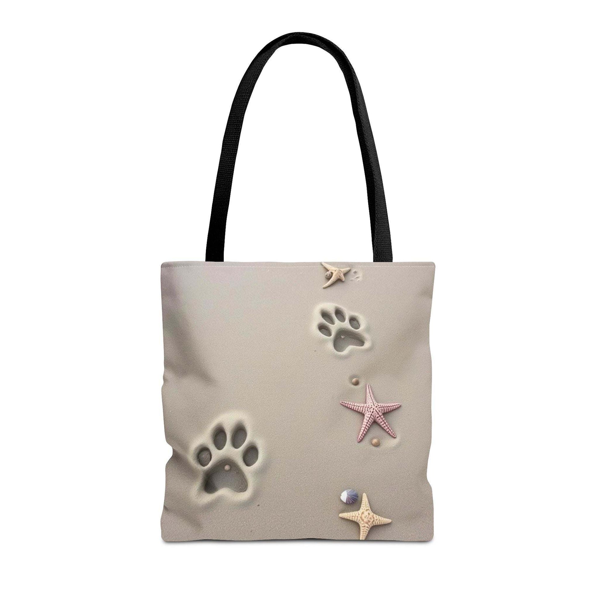 Beach tote bag with paw and starfish design, perfect for pet lovers and beach outings.