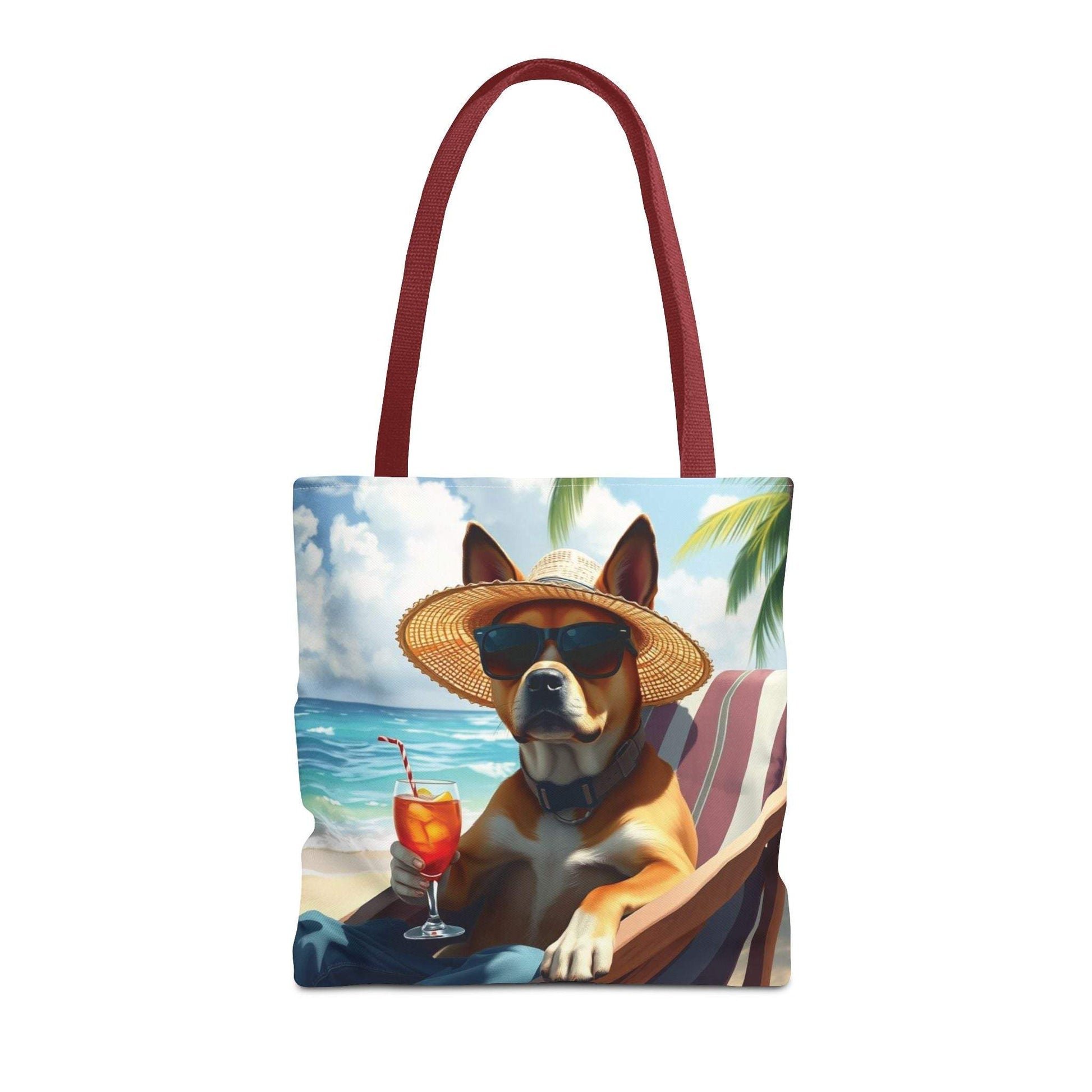 Dog tote bag with summer beach design featuring a relaxed dog sipping a drink.