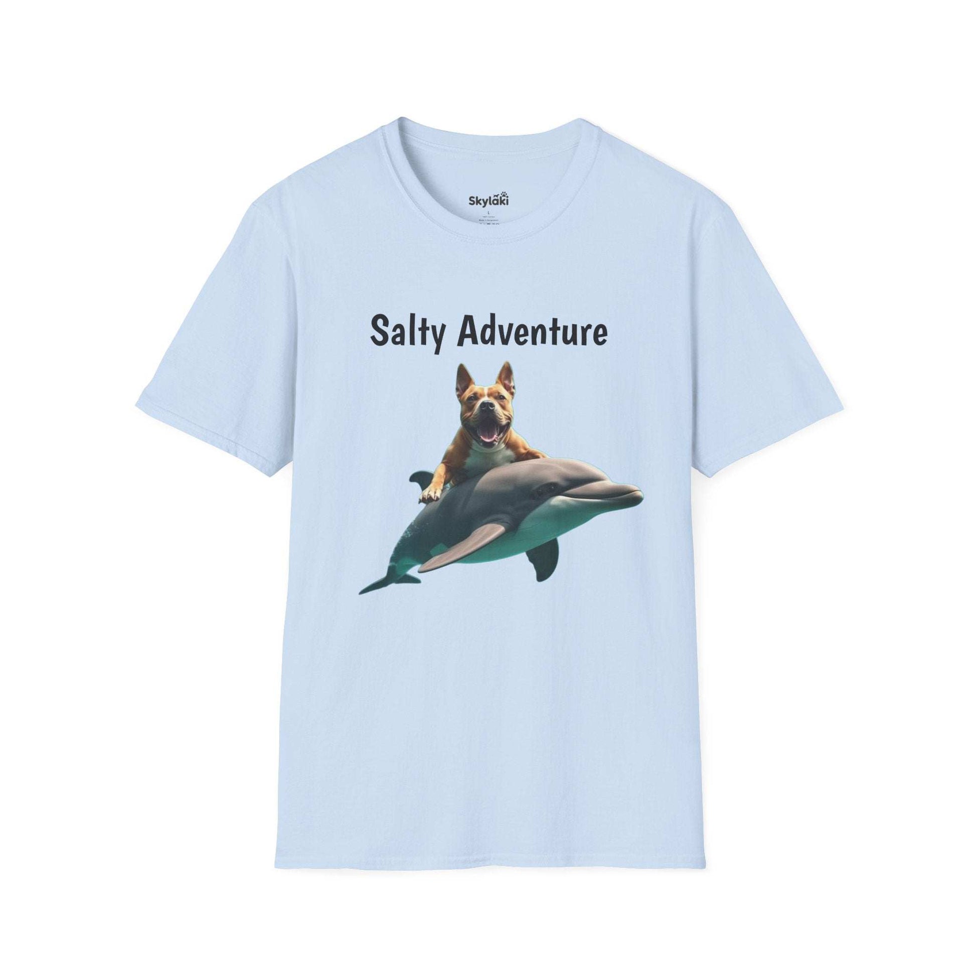 Unisex softstyle t-shirt with "Salty Adventure" graphic featuring dog on dolphin, perfect for fun beach life enthusiasts.
