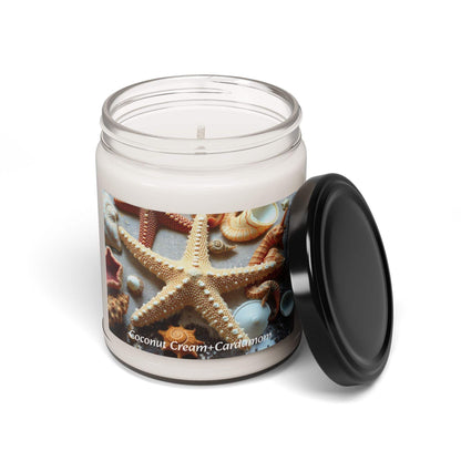 Scented soy candle in a glass jar with coconut cream and cardamom fragrance, featuring coastal decor.