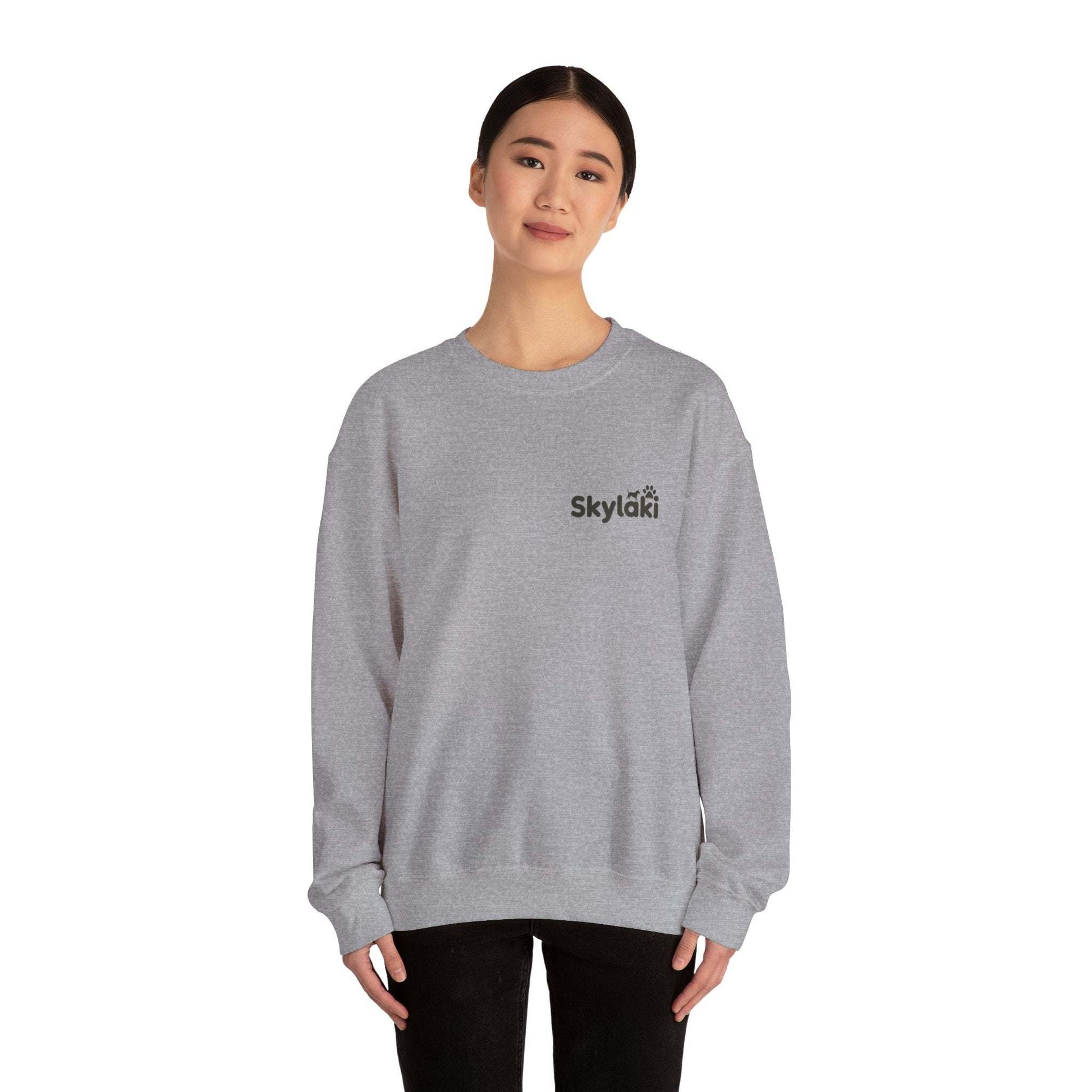 Skylaki Unisex Heavy Blend™ Crewneck Sweatshirt in gray, showcasing cozy comfort and everyday style.