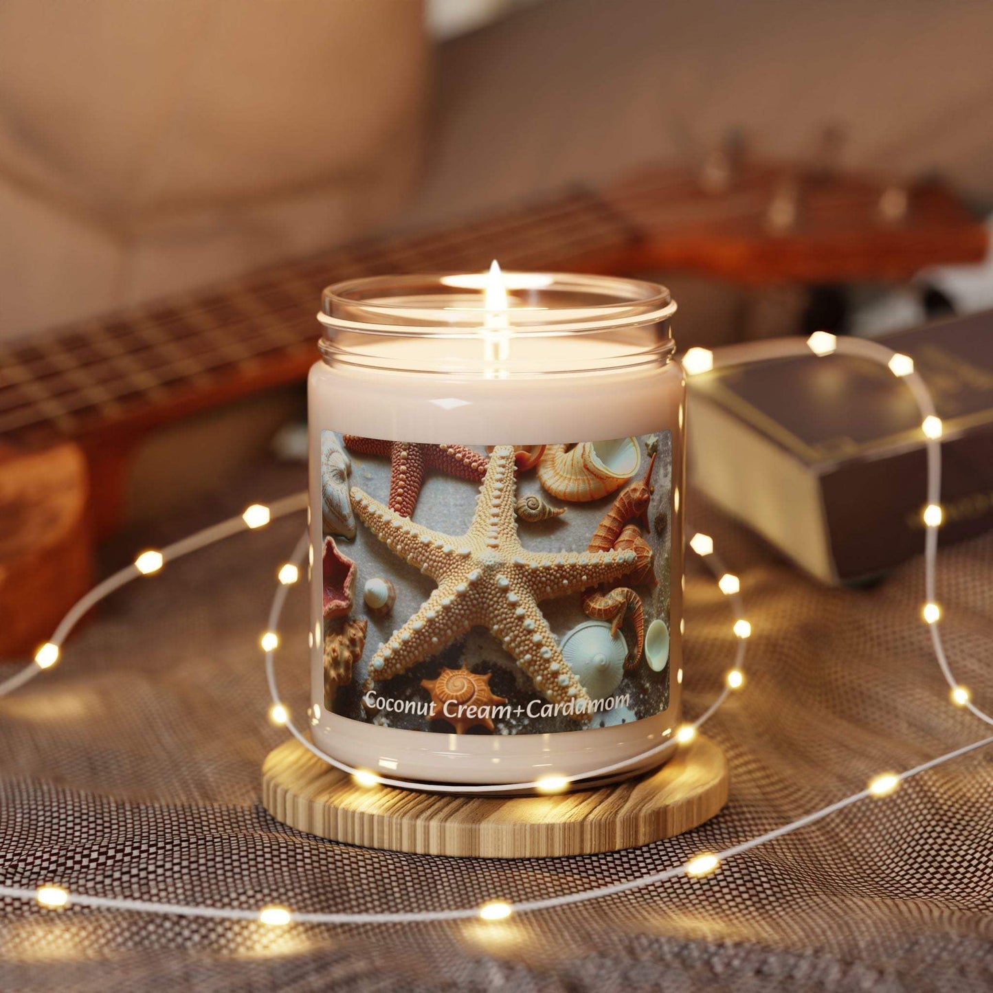 Scented soy candle with coconut cream and cardamom, featuring coastal decor for relaxing home fragrance.
