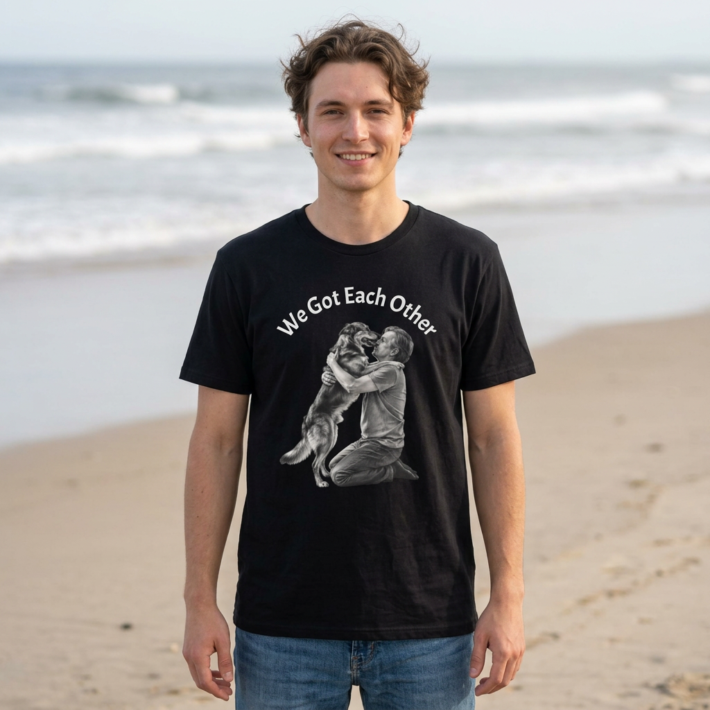 We Got Each Other lightweight cotton tee with black-and-white dog and owner embrace illustration