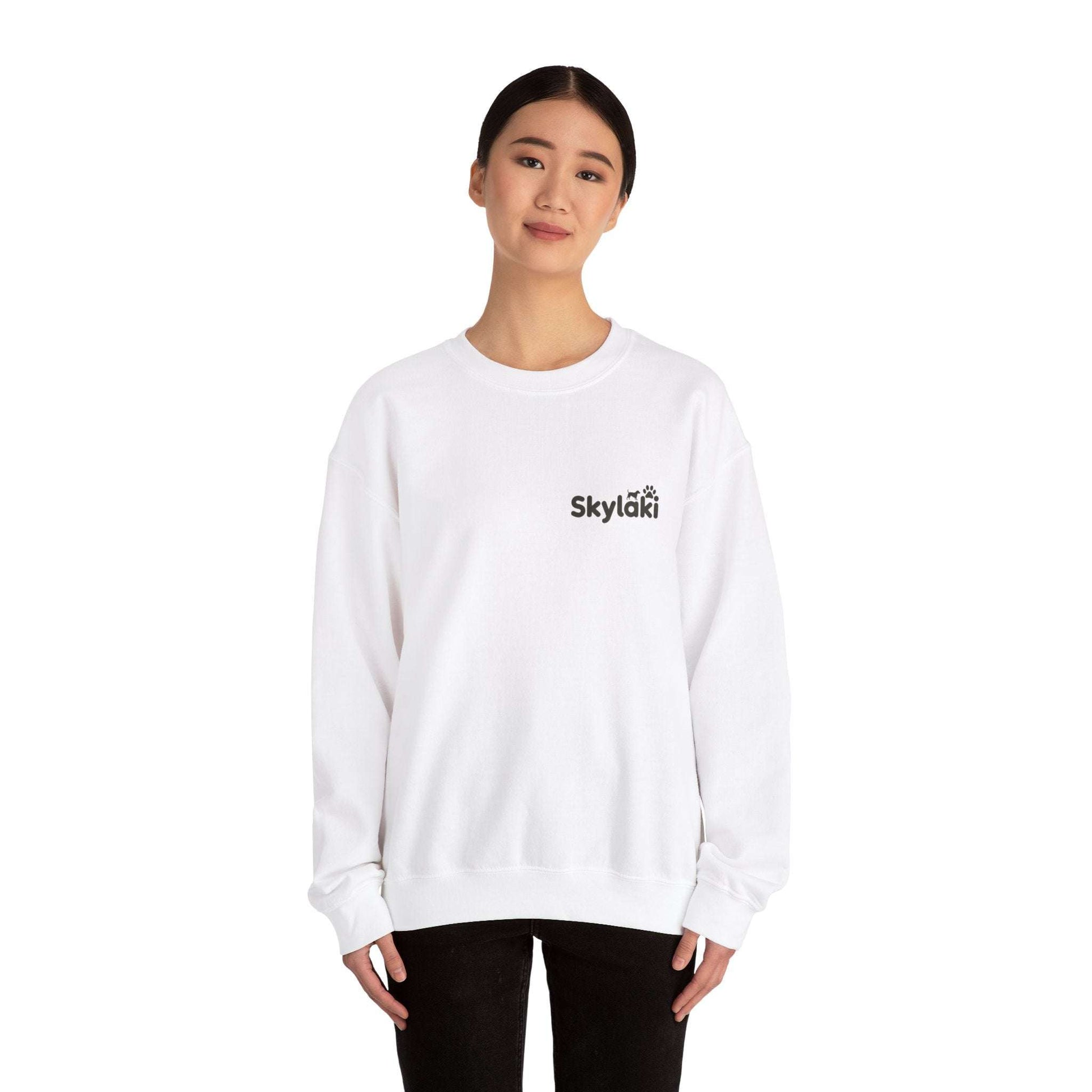 Unisex Heavy Blend™ Crewneck Sweatshirt in white, modeled, showcasing cozy comfort and stylish design for everyday wear.