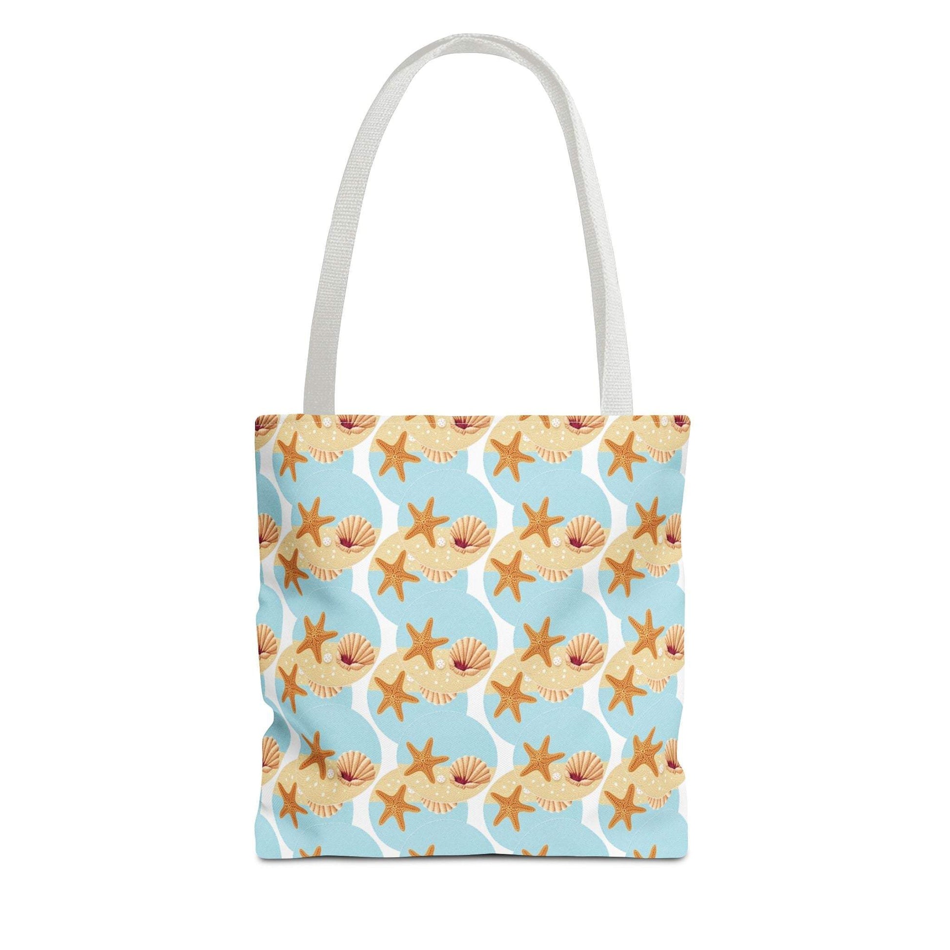 Seashell and starfish beach tote bag with coastal pattern for summer outings.