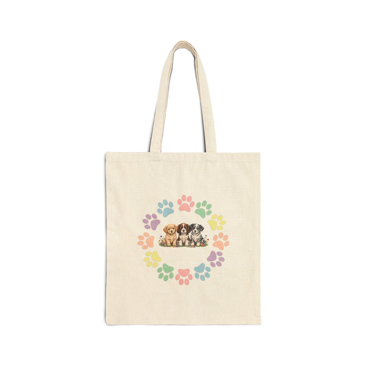 Natural canvas tote bag with colorful rainbow dog paw prints arranged in a circular wreath - Skylaki brand