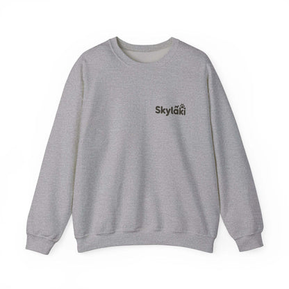 Skylaki Unisex Heavy Blend™ Crewneck Sweatshirt in gray, featuring cozy cotton-polyester fabric and a relaxed fit.