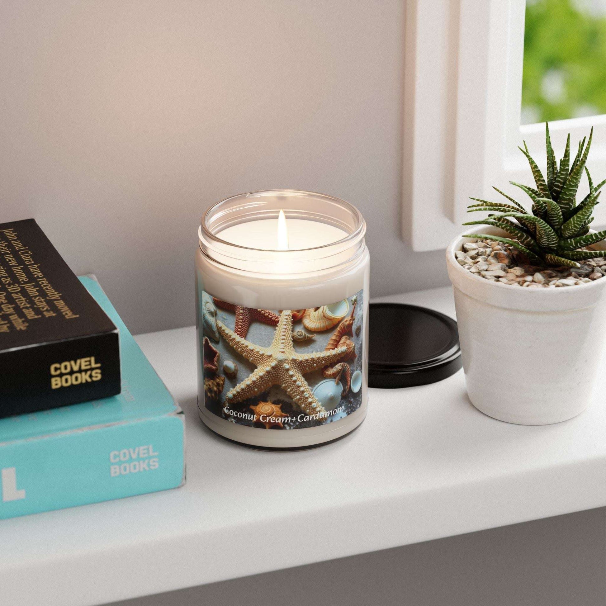 Scented soy candle with coconut cream and cardamom, in a glass jar, enhancing home decor with coastal fragrance.