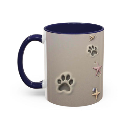 Nautical coffee mug with starfish and paw prints design.