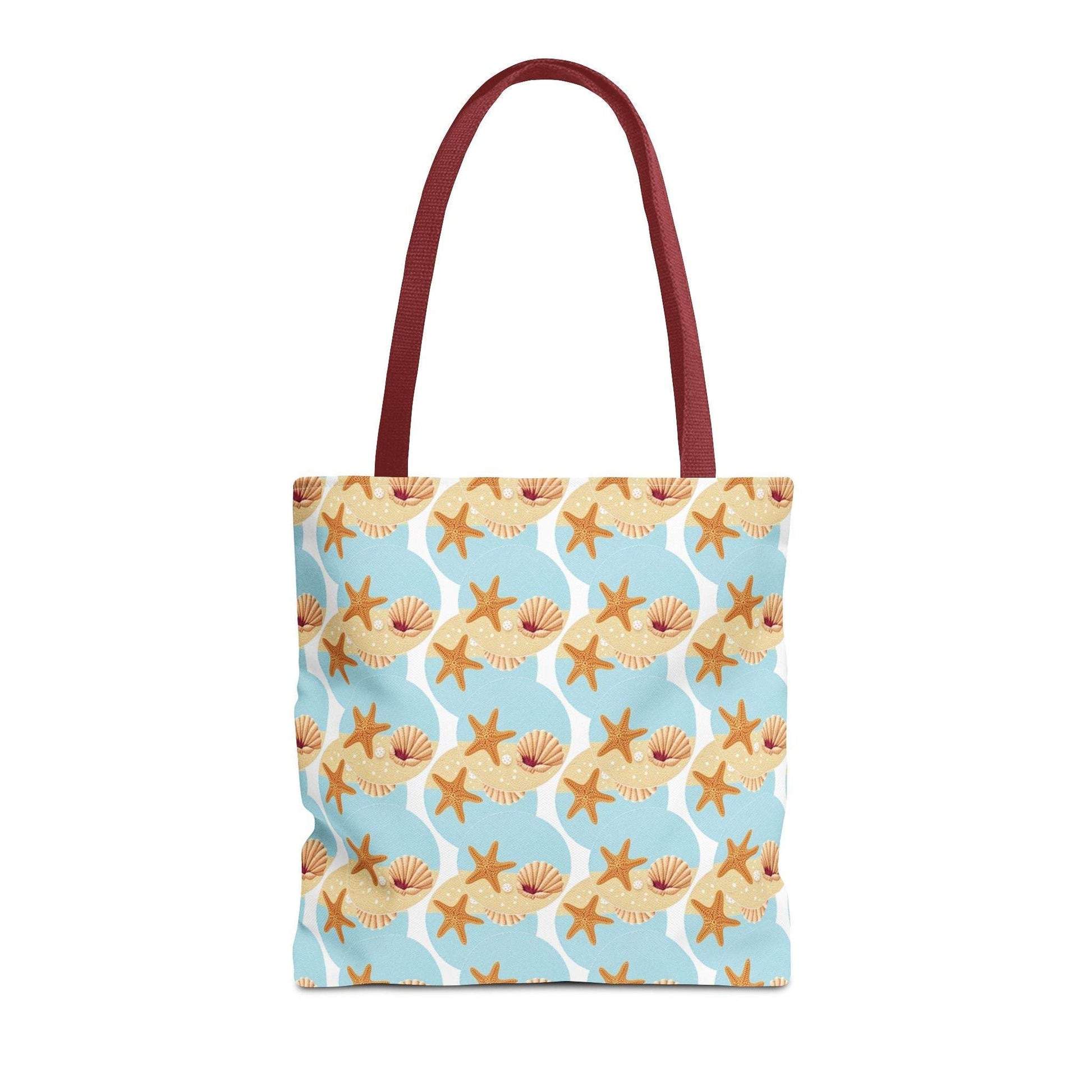 Seashell & Starfish Beach Tote Bag with coastal pattern and red handles.