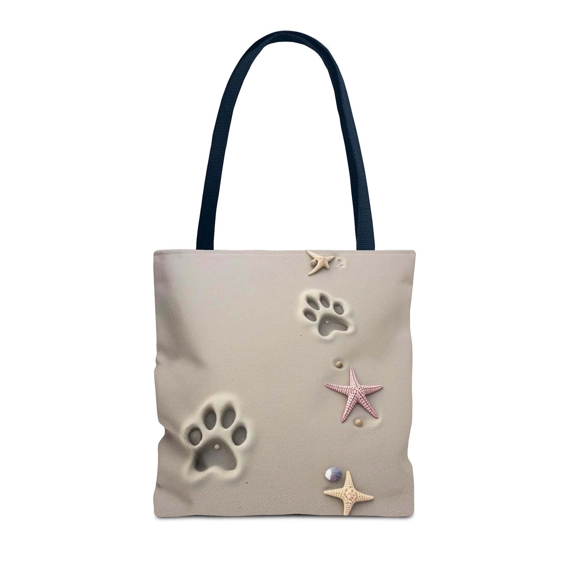 Beach tote bag with paw print and starfish design, perfect for pet lovers and beach outings.