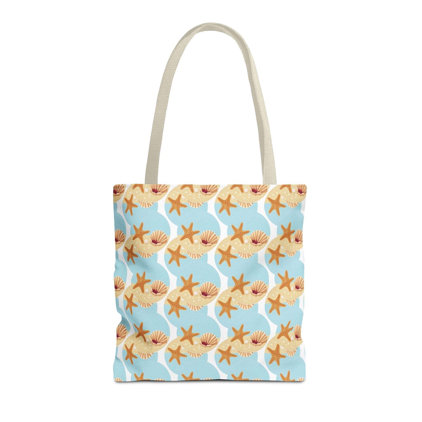 Seashell and starfish beach tote bag with coastal pattern on a blue background, featuring beige handles.