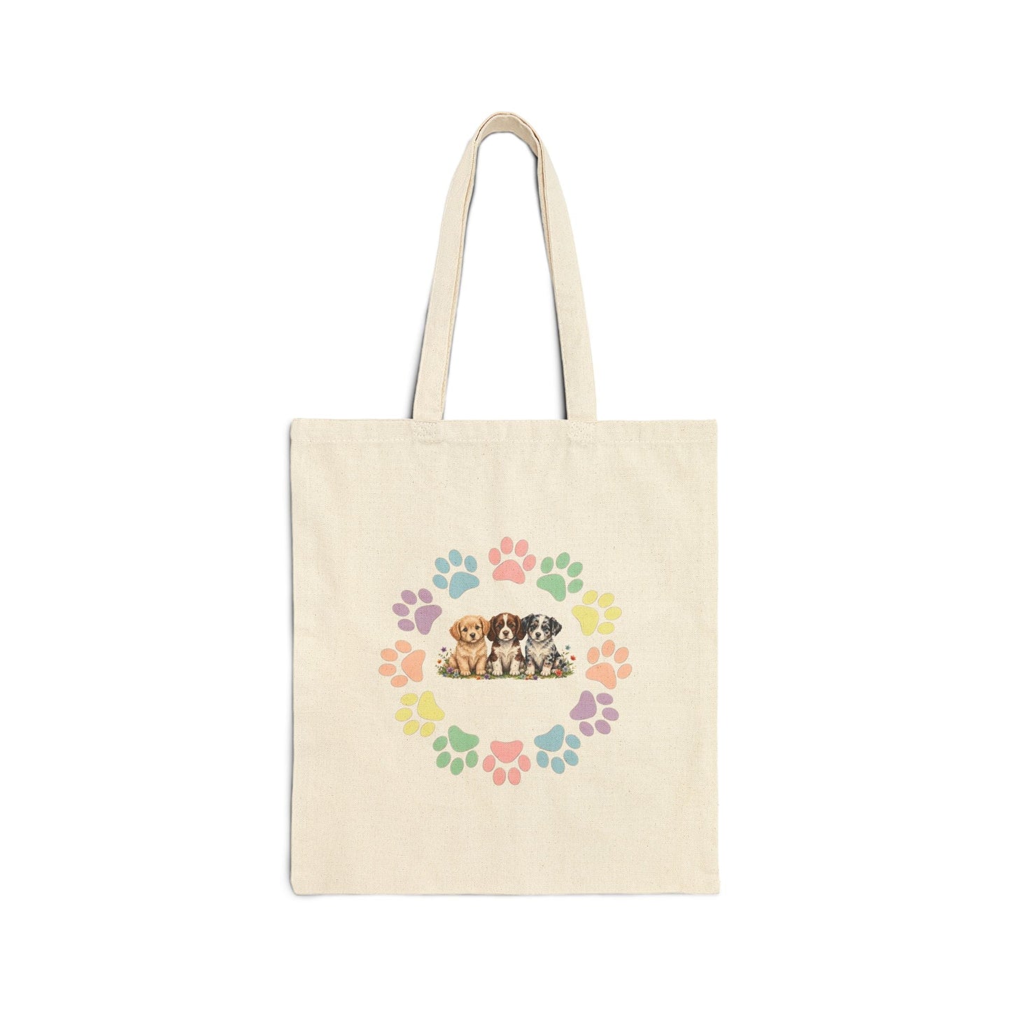 Natural canvas tote bag with colorful rainbow dog paw prints arranged in a circular wreath - Skylaki brand