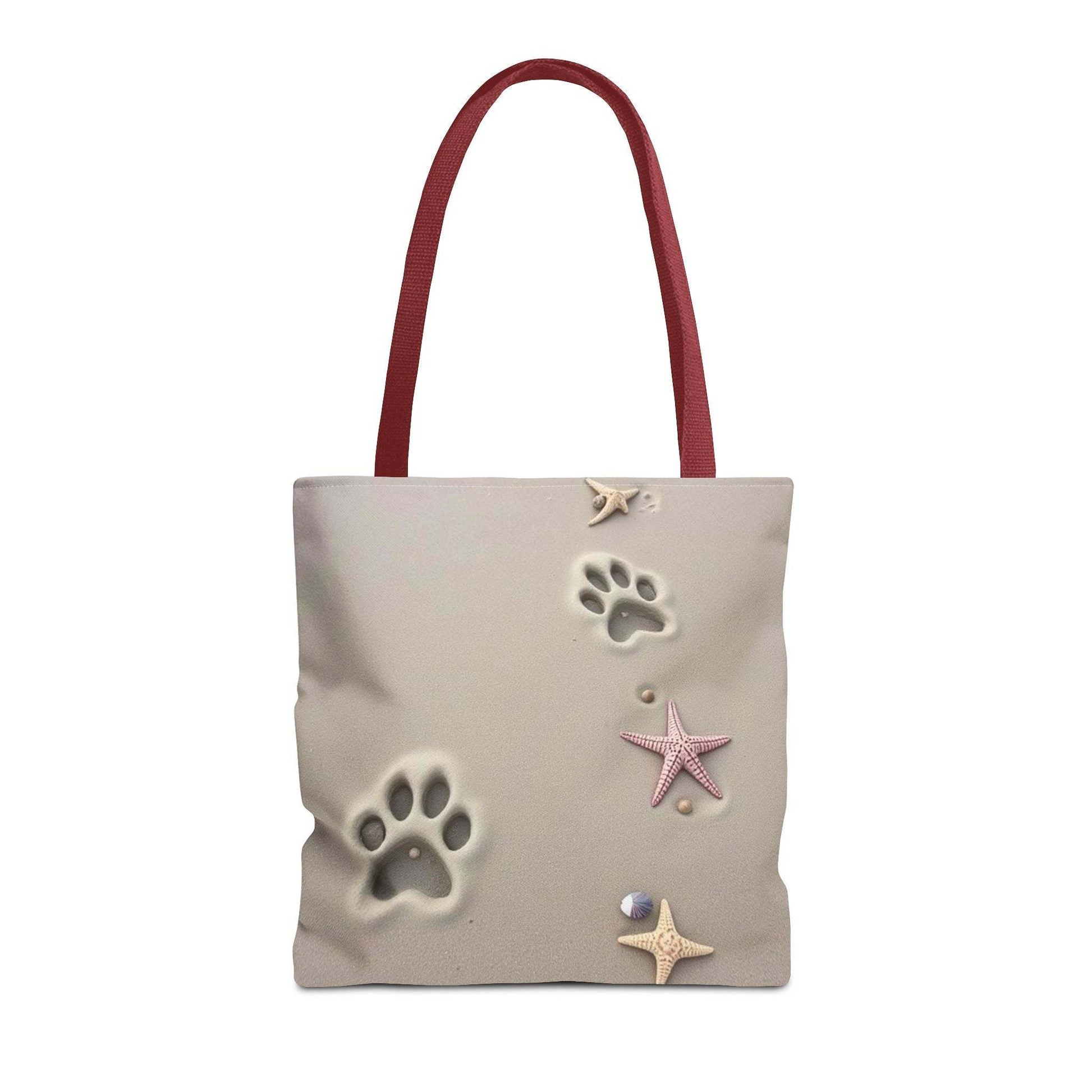 Beach tote bag with paw and starfish design, perfect for pet lovers and beach outings.