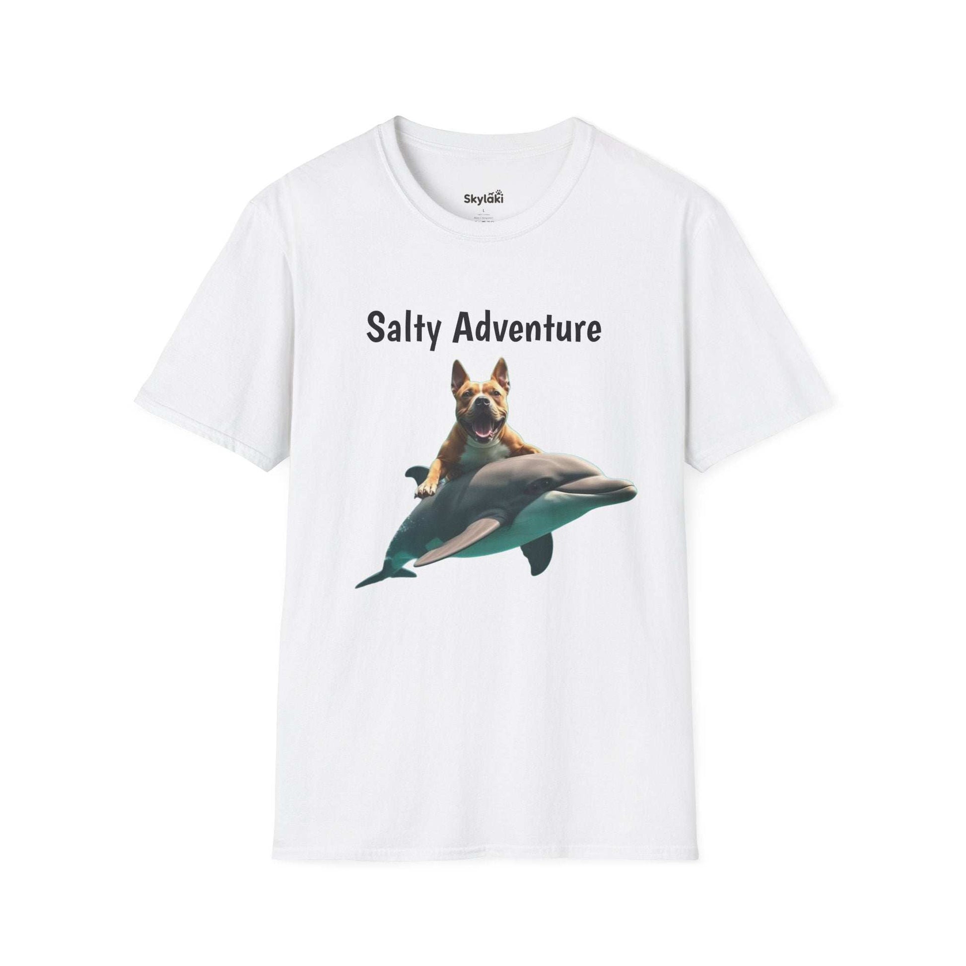 Unisex softstyle Beachy Tee with "Salty Adventure" graphic, featuring a dog riding a dolphin, celebrating fun beach life.