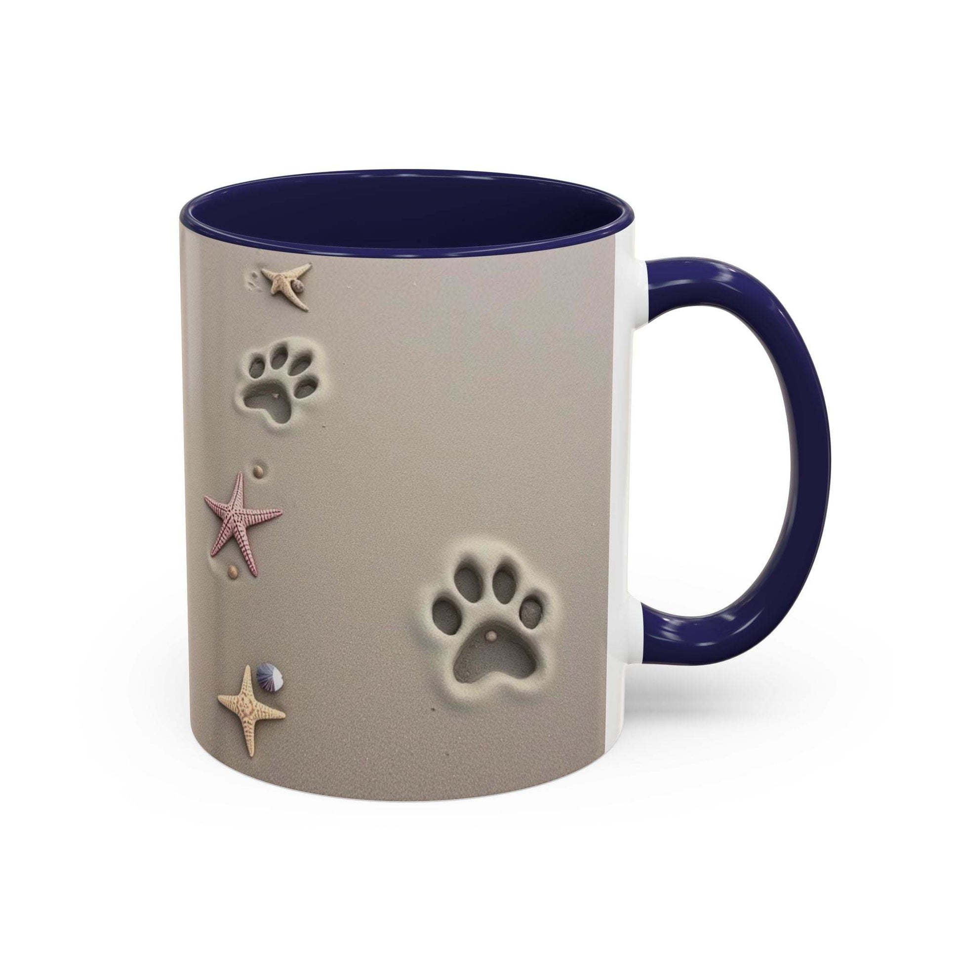 Nautical coffee mug with starfish and paw prints design, ideal for beach lovers.